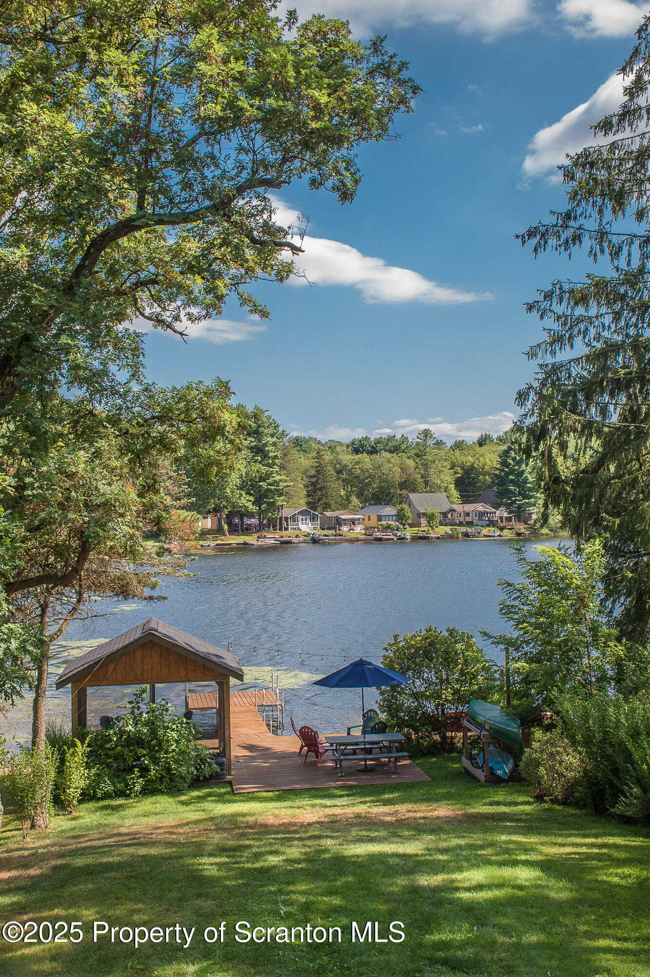 260 Baylors Lake Road Fleetville, PA 18420 - Photo 14 of 69 a view of house with yard and ocean view