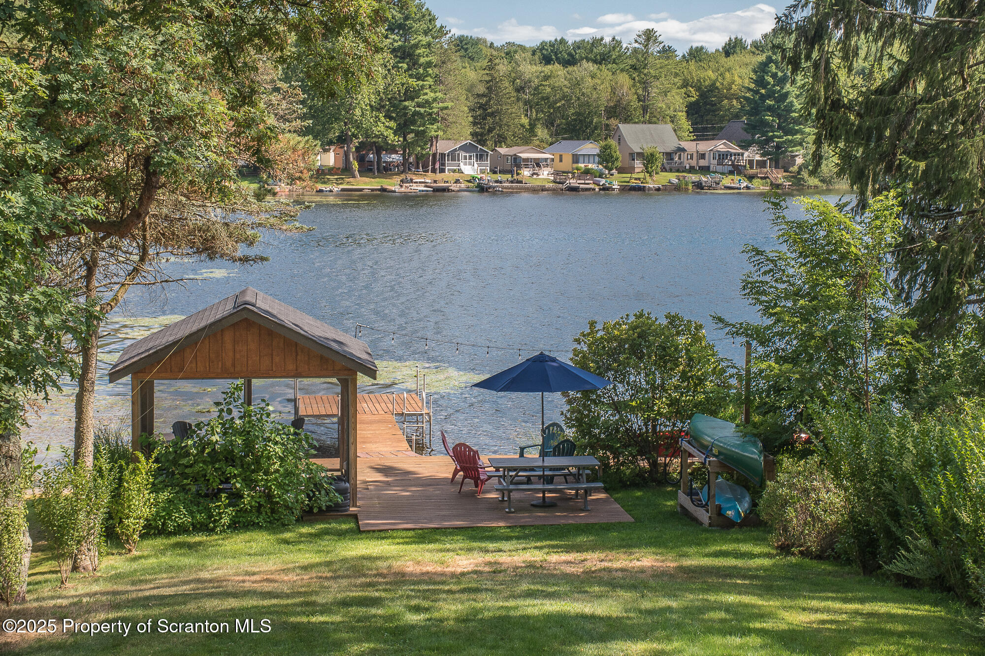 260 Baylors Lake Road Fleetville, PA 18420 - Photo 15 of 69 a view of a house with a yard and sitting area
