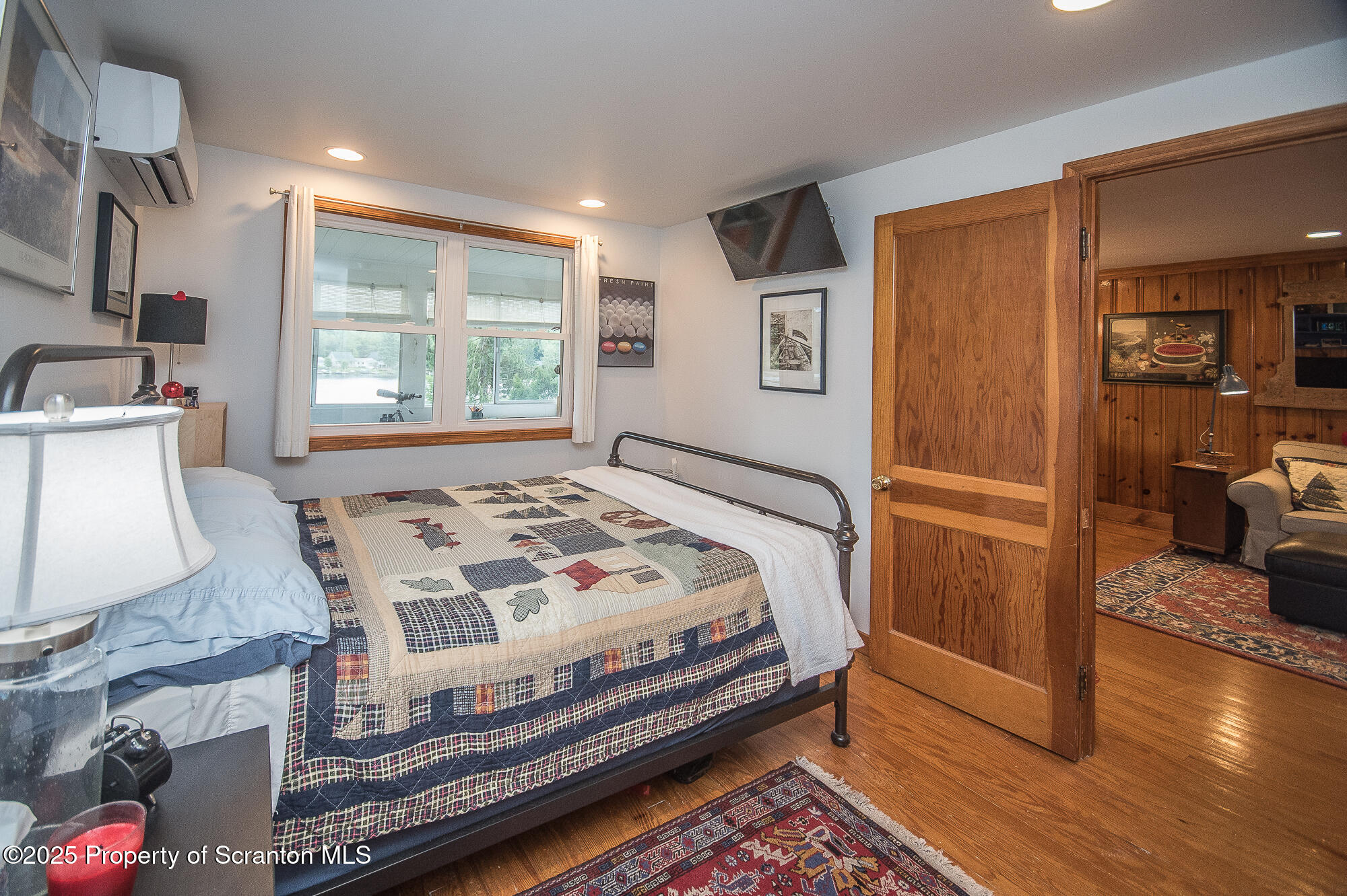 260 Baylors Lake Road Fleetville, PA 18420 - Photo 43 of 69 a bedroom with a bed and a dresser