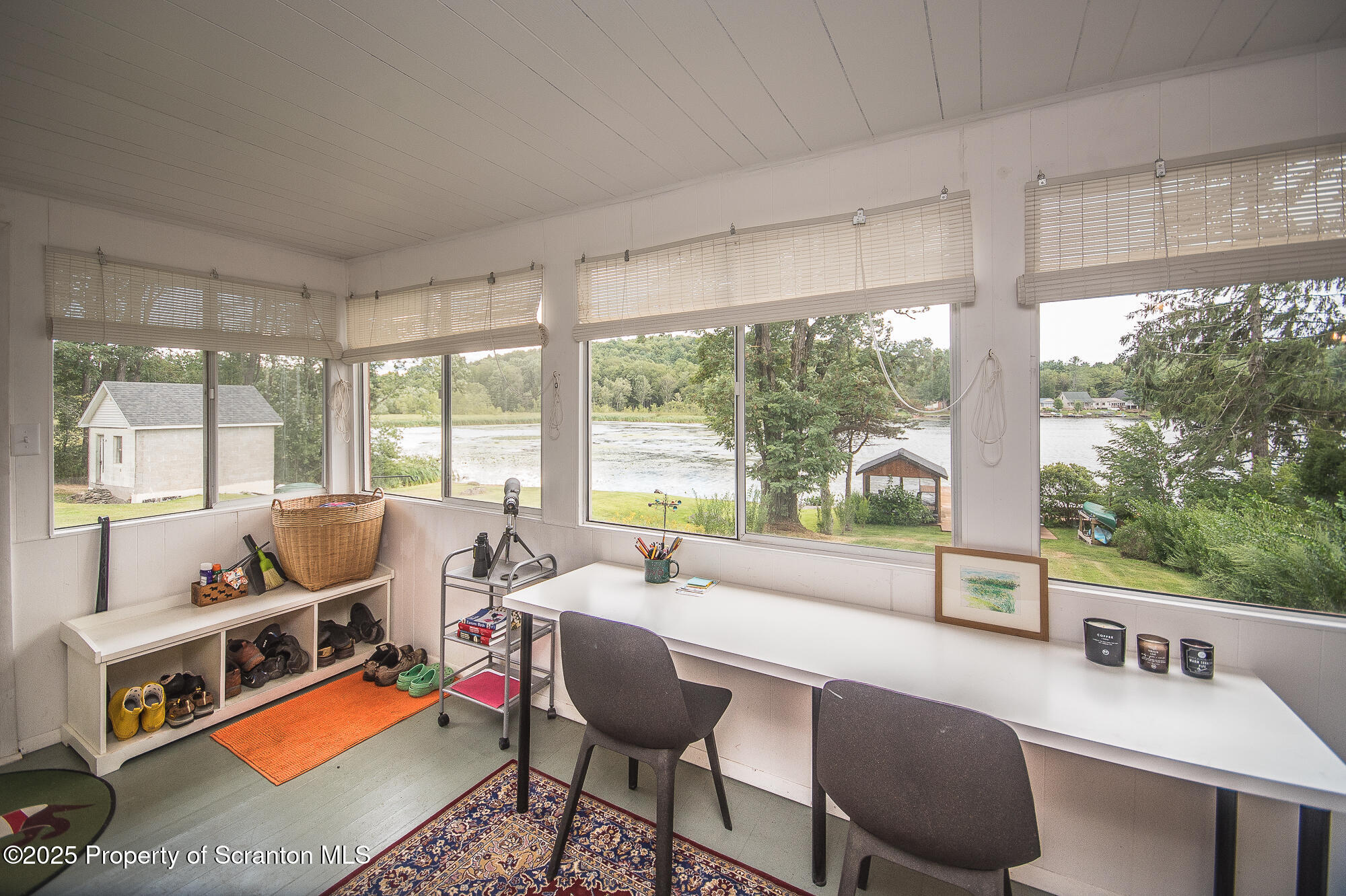 260 Baylors Lake Road Fleetville, PA 18420 - Photo 48 of 69 a bedroom with furniture and a large window
