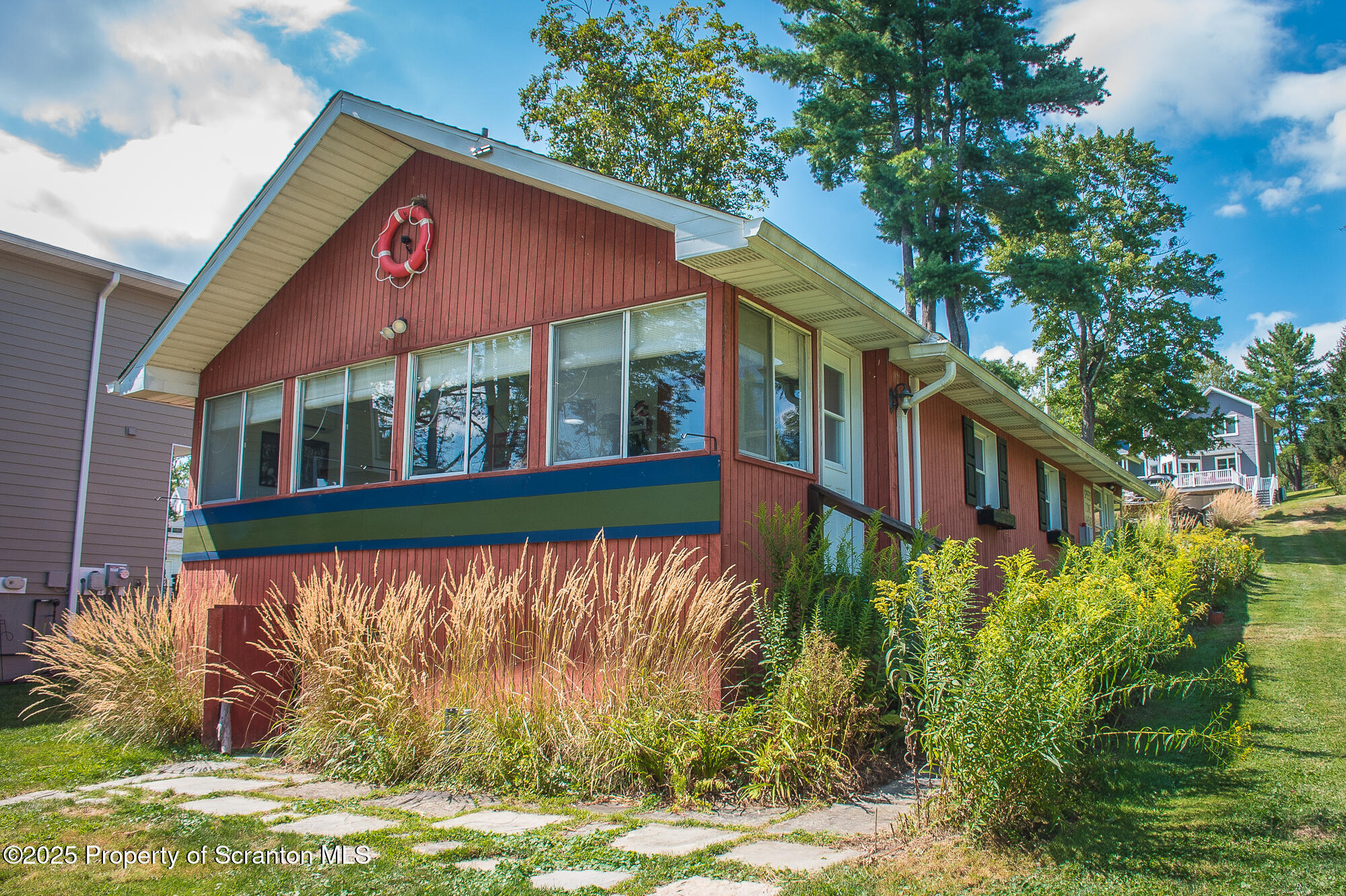 260 Baylors Lake Road Fleetville, PA 18420 - Photo 5 of 69 a view of a house with a yard