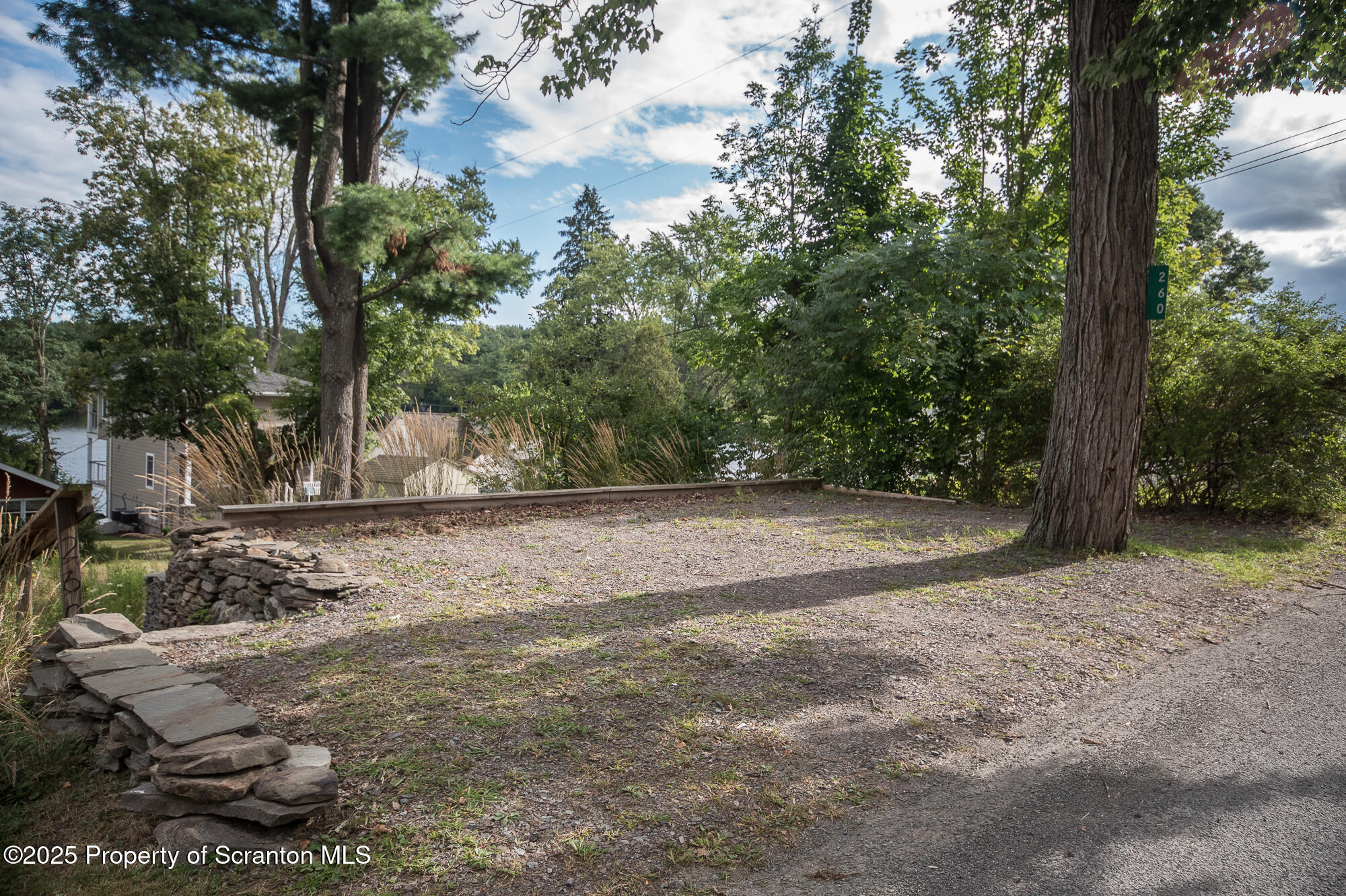 260 Baylors Lake Road Fleetville, PA 18420 - Photo 68 of 69 a view of a yard with large trees