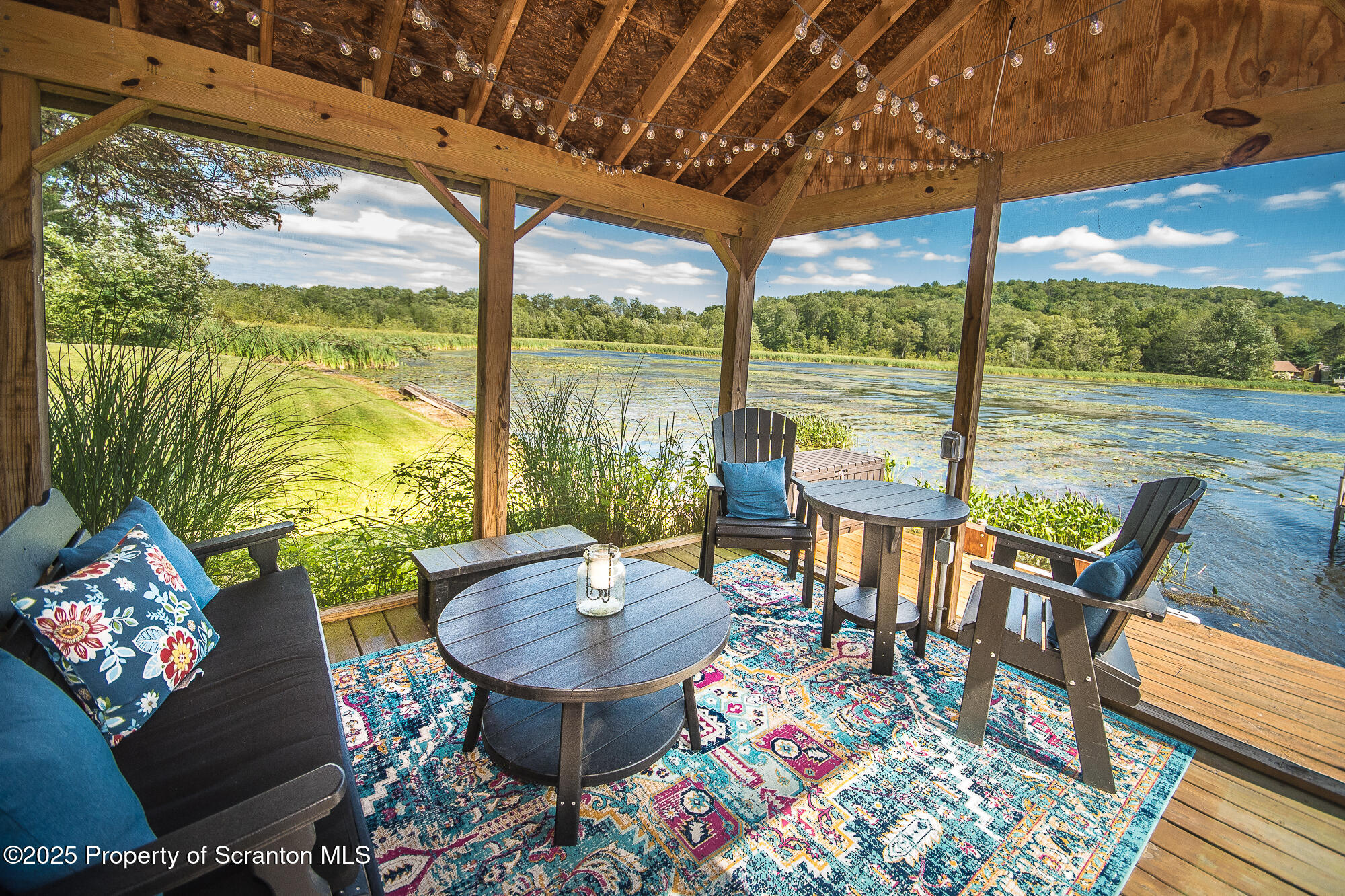 260 Baylors Lake Road Fleetville, PA 18420 - Photo 7 of 69 a outdoor living space with furniture and garden view