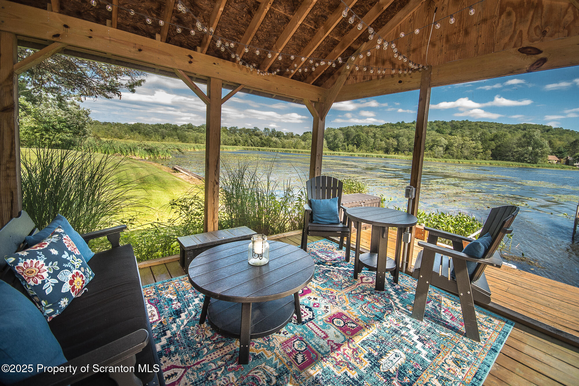 260 Baylors Lake Road Fleetville, PA 18420 - Photo 8 of 69 a outdoor living space with furniture and garden view