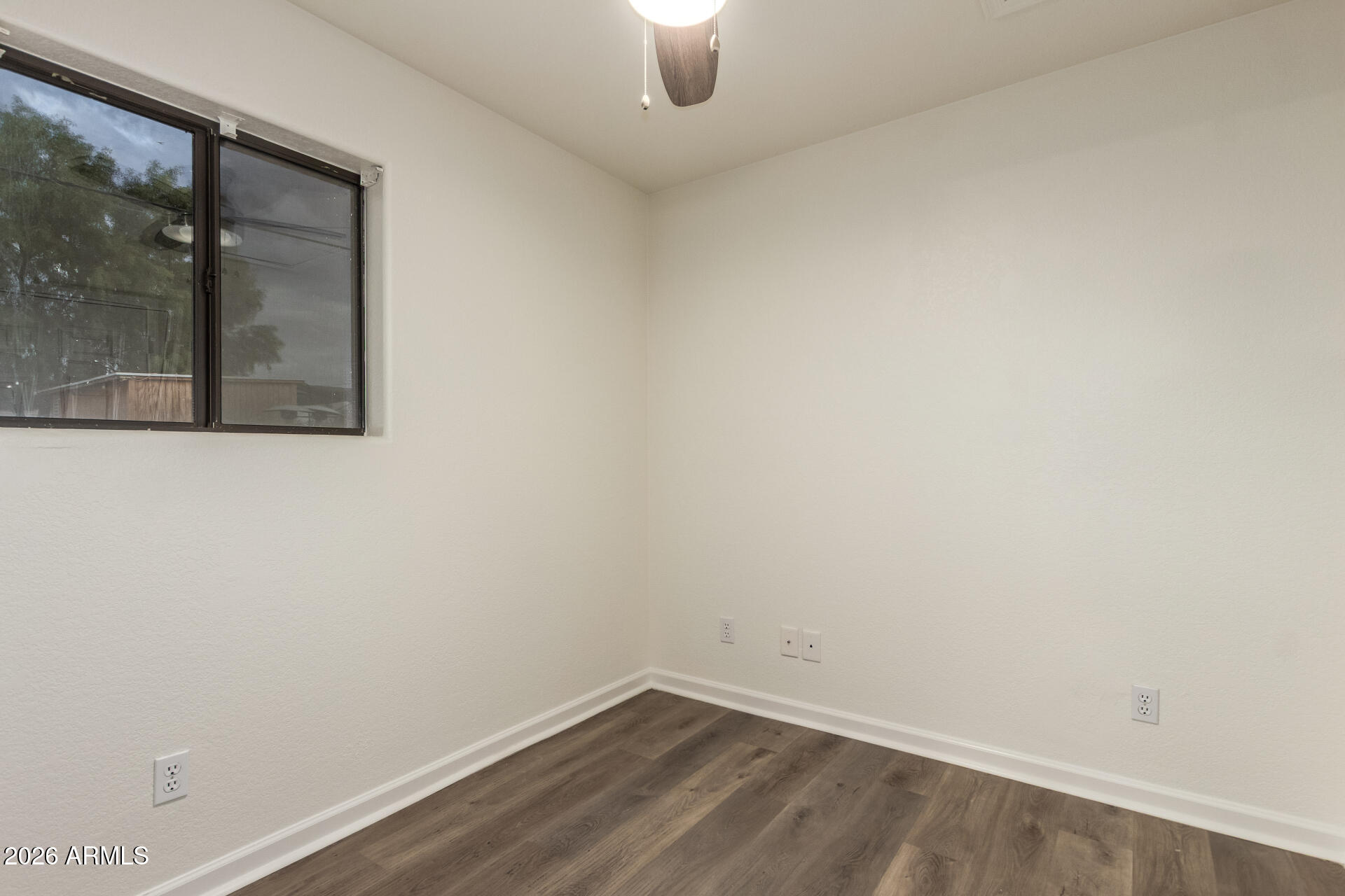 335 South Stardust Lane Apache Junction, AZ 85120 - Photo 19 of 31 a view of a small space with wooden floor and a window
