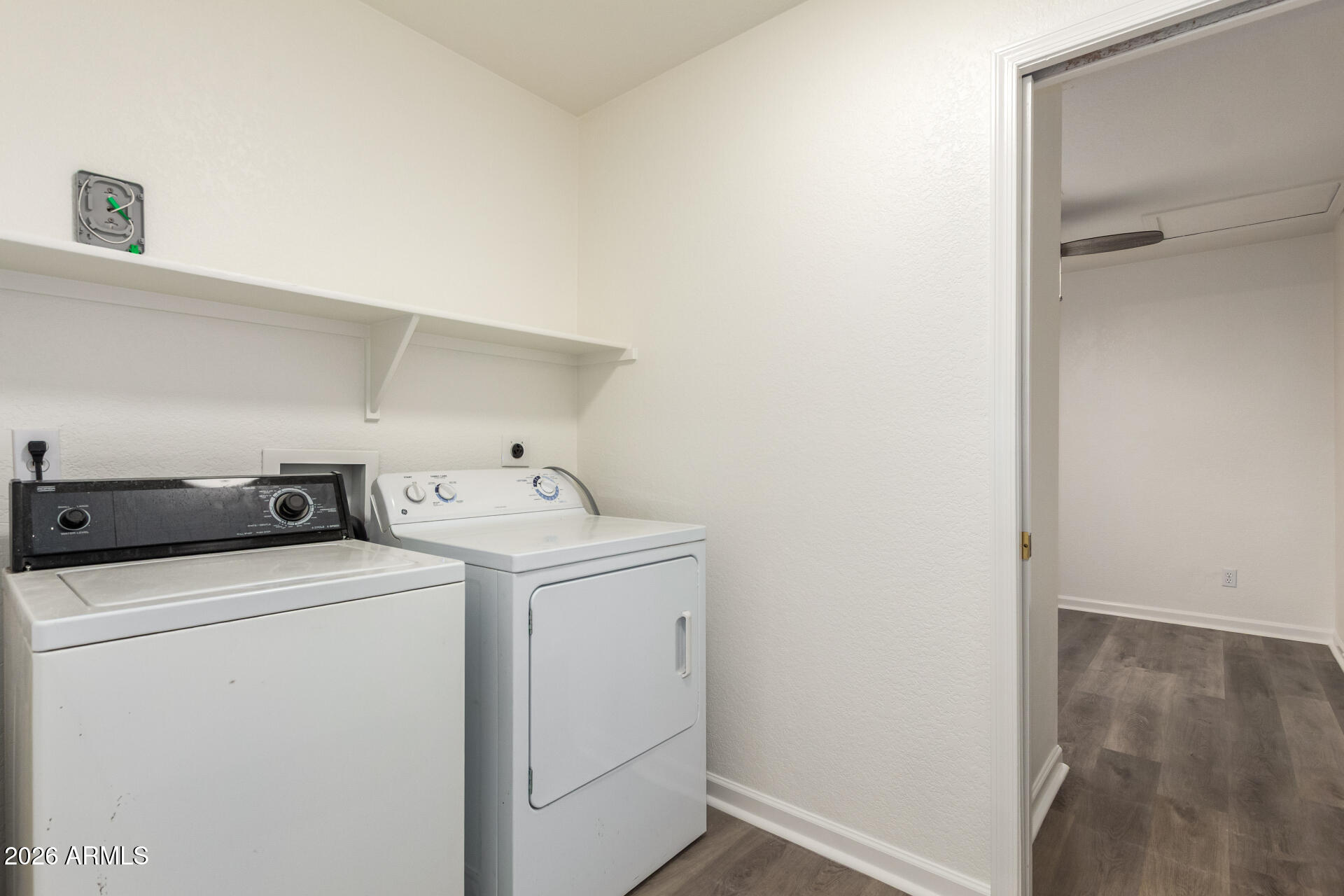 335 South Stardust Lane Apache Junction, AZ 85120 - Photo 21 of 31 a utility room with dryer and washer