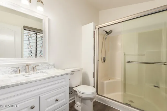 a kitchen with stainless steel appliances a refrigerator stove and sink