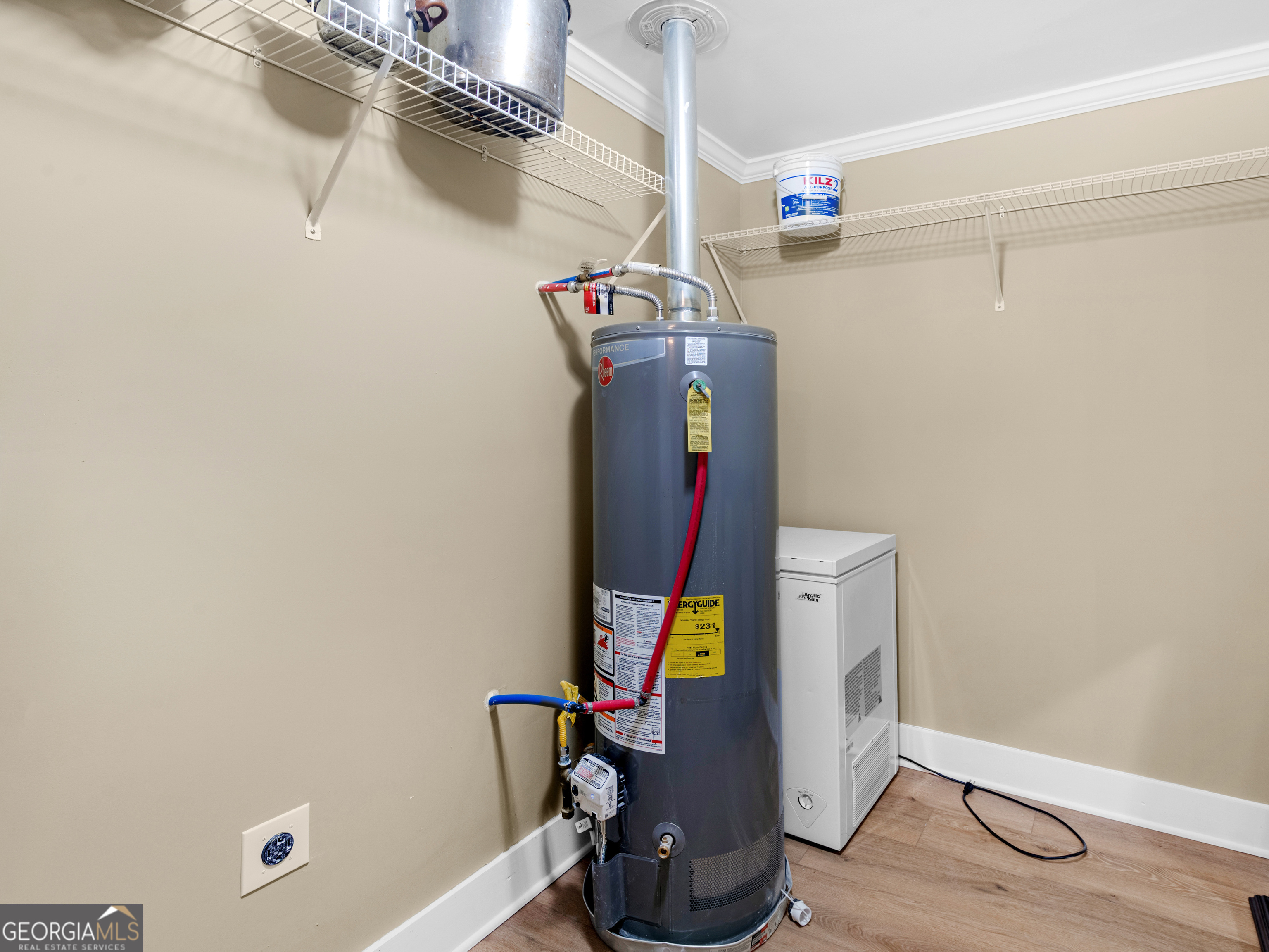 149 Akins Street Barnesville, GA 30204 - Photo 11 of 27 a view of storage and utility room with wooden floor