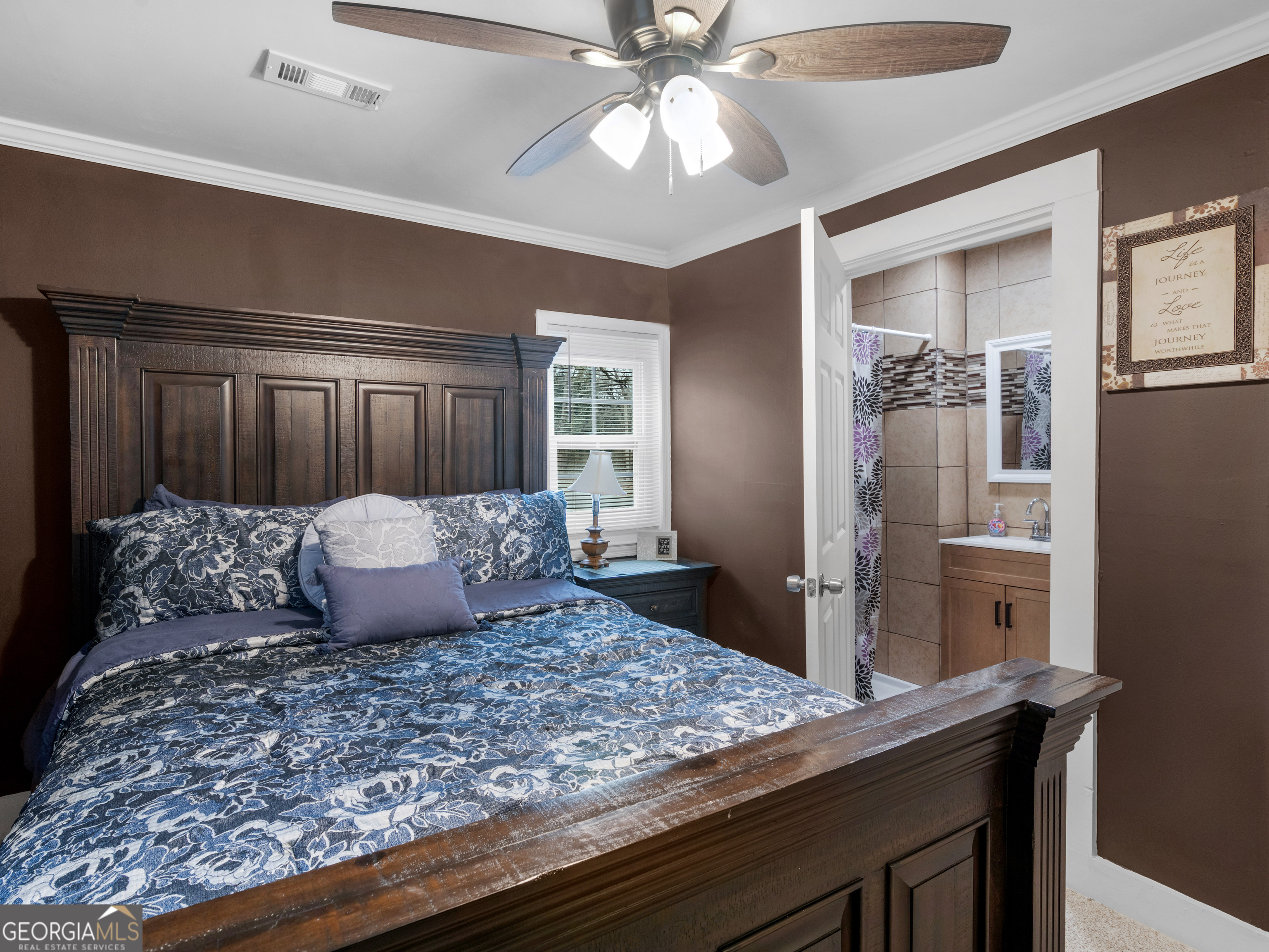 149 Akins Street Barnesville, GA 30204 - Photo 13 of 27 a large bed sitting in a room next to a window