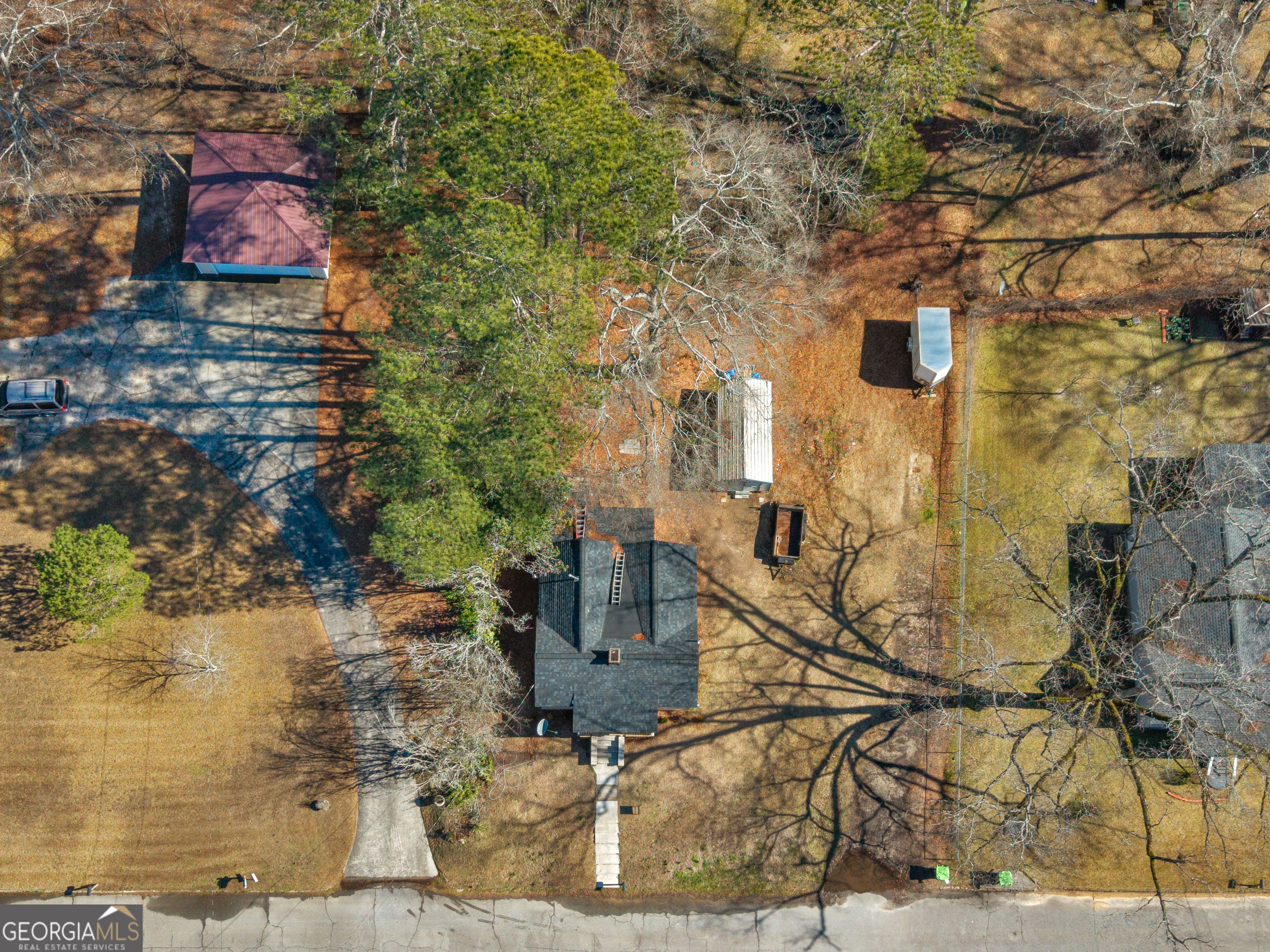 149 Akins Street Barnesville, GA 30204 - Photo 22 of 27 a picture of street with building and trees