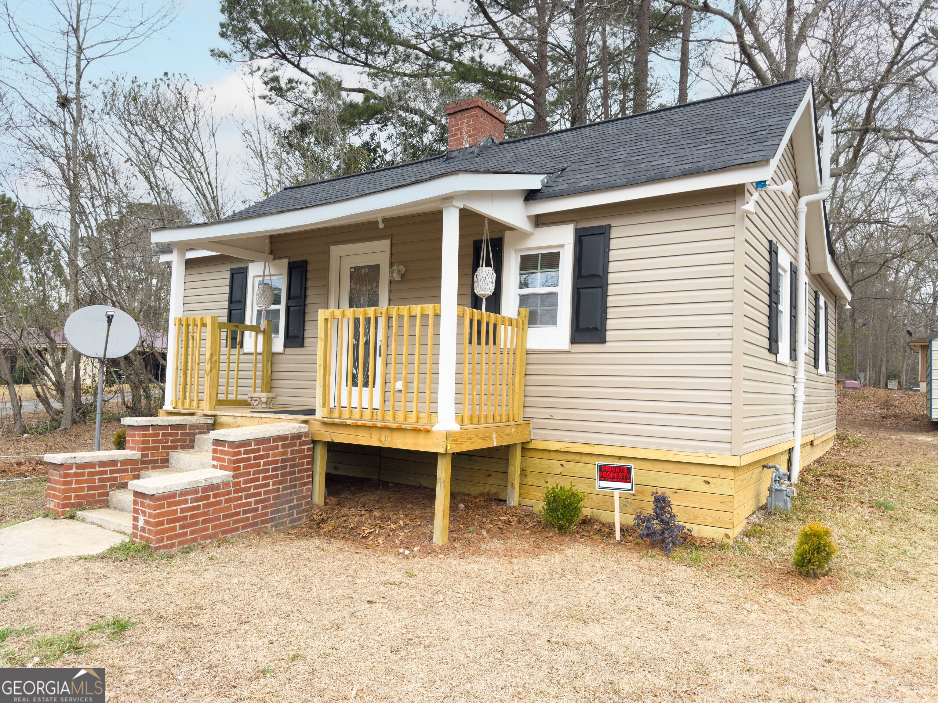149 Akins Street Barnesville, GA 30204 - Photo 27 of 27 a view of a house with a patio