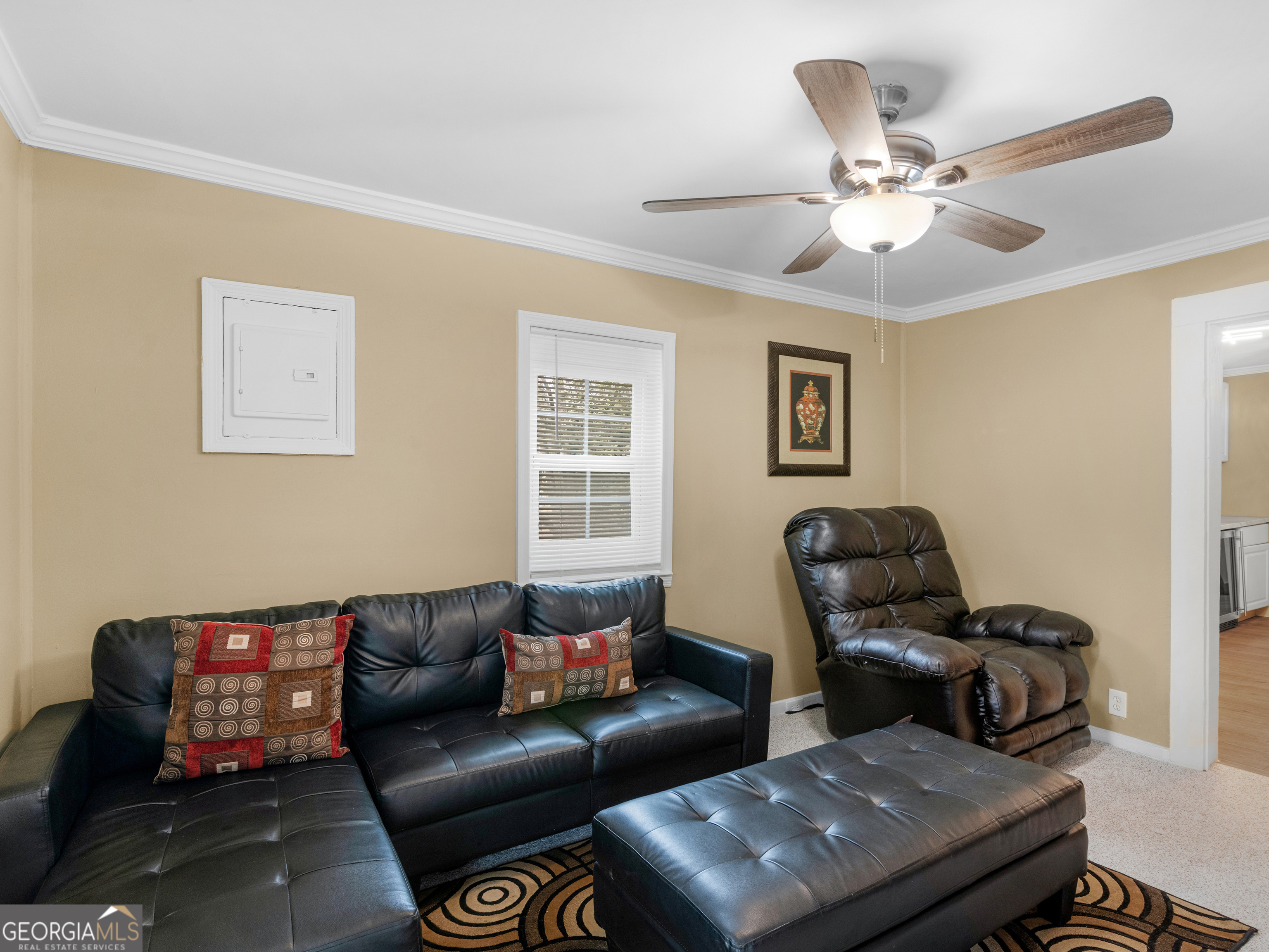 149 Akins Street Barnesville, GA 30204 - Photo 5 of 27 a living room with furniture and a window