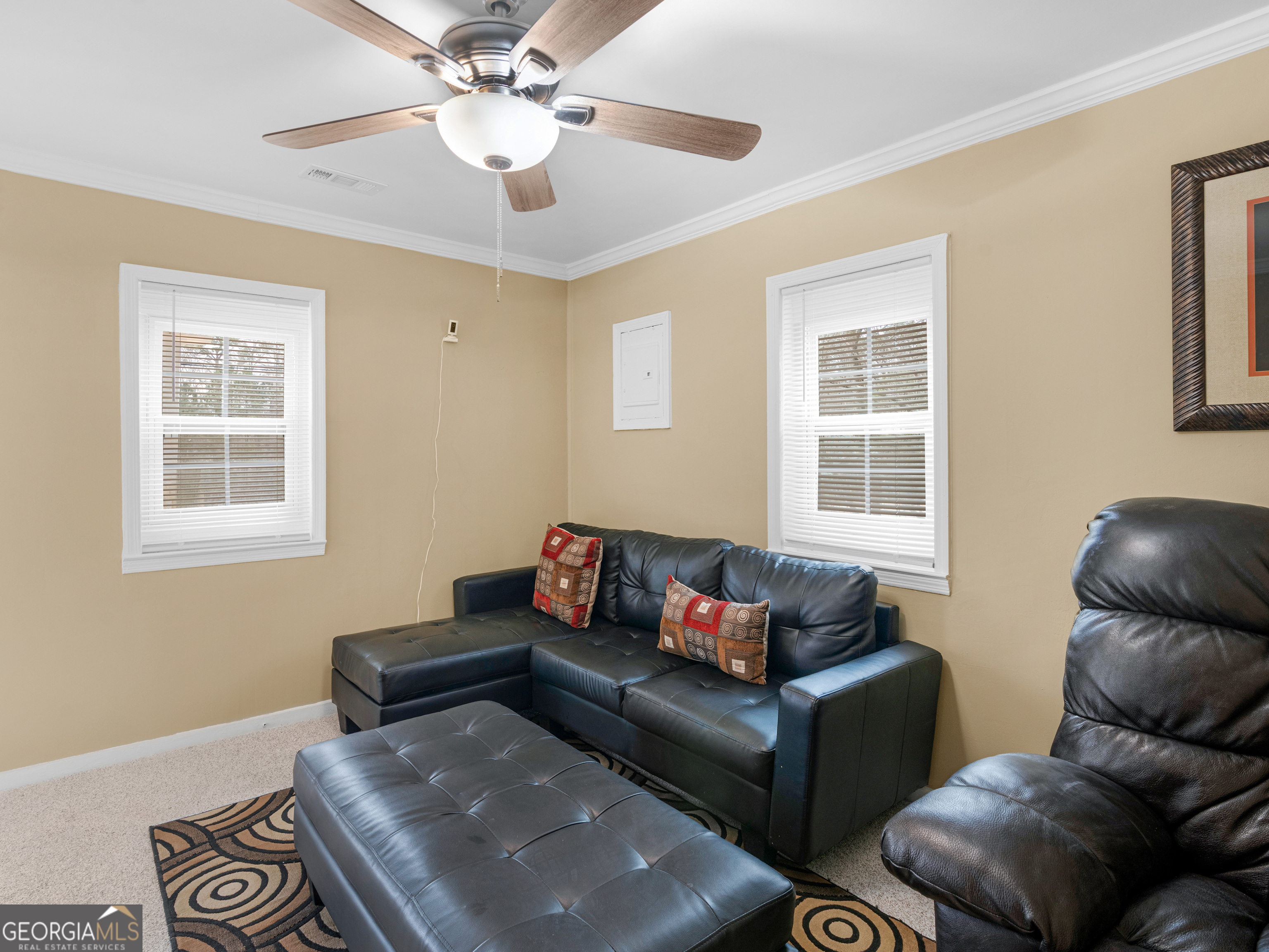 149 Akins Street Barnesville, GA 30204 - Photo 6 of 27 a living room with furniture and a window