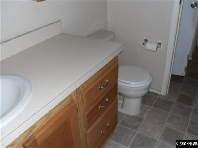357 Rue De Lane Sparks, NV 89434 - Photo 2 of 7 a bathroom with a toilet and a sink