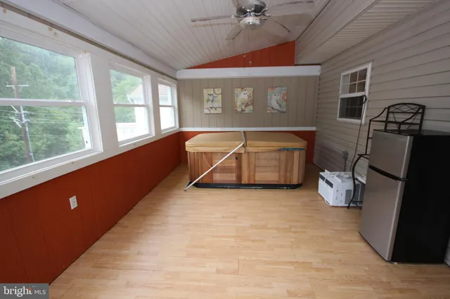 a room with furniture and window