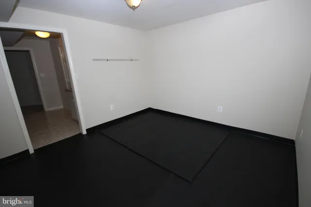 a view of backyard with wooden floor