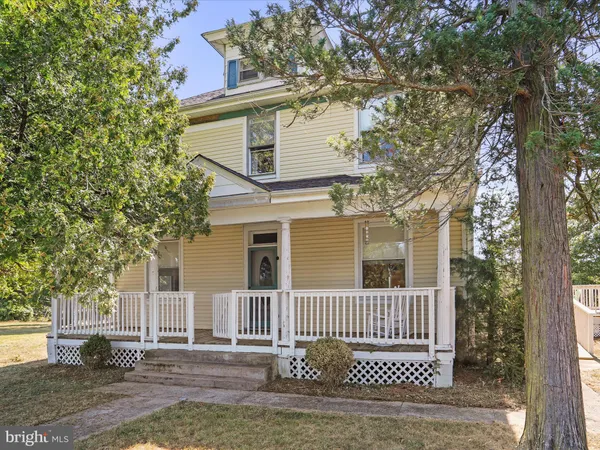 front view of a house with a street