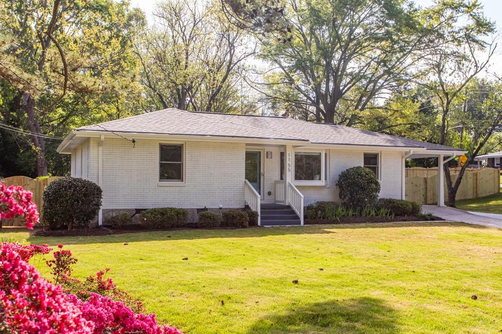1155 Larch Lane Decatur, GA 30033 - Photo 1 of 1 a front view of a house with a yard