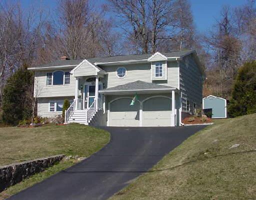 192 Carroll Road Fairfield, CT 06824 - Photo 1 of 1 front view of a house with a yard