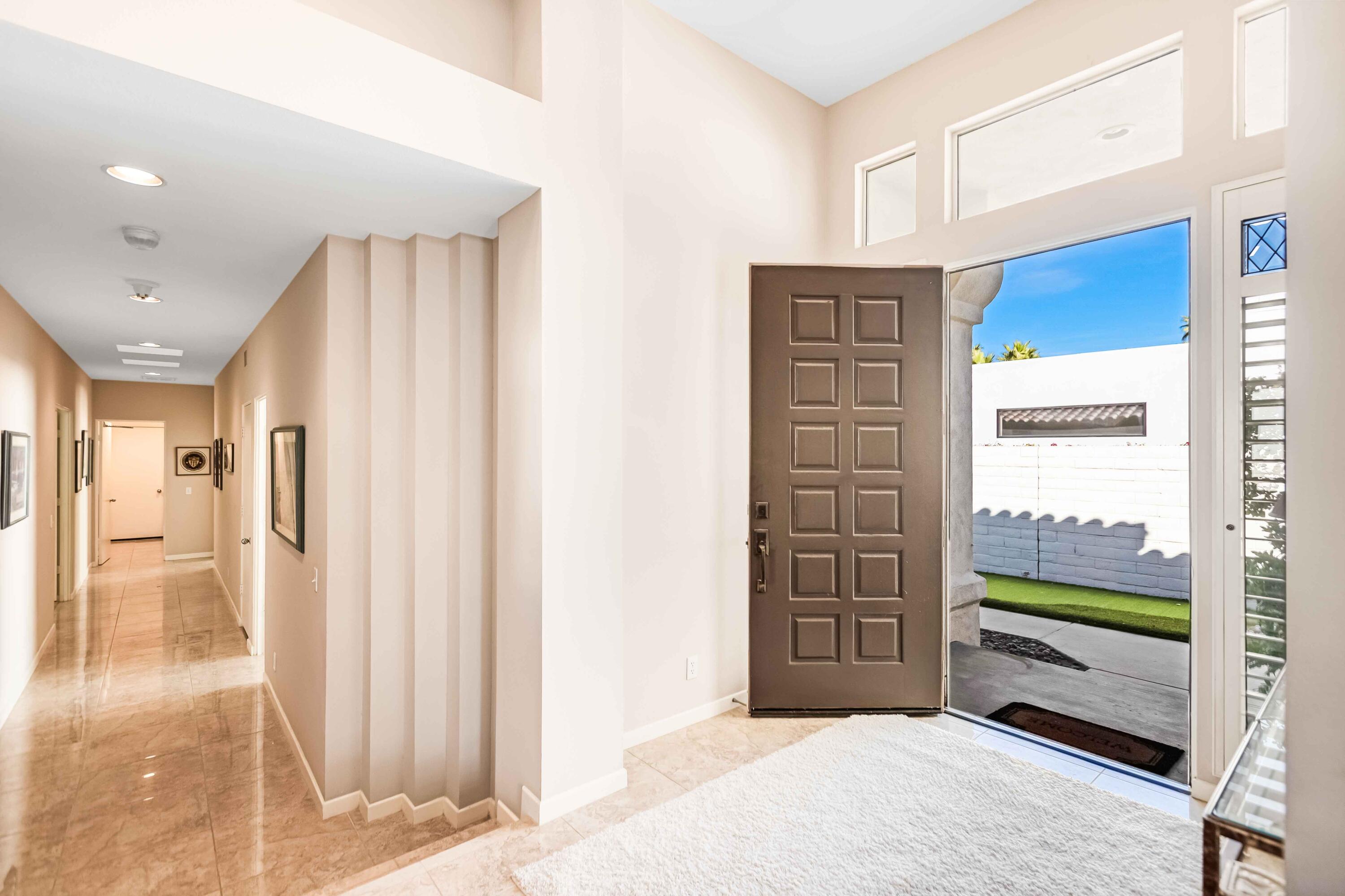 57600 Interlachen La Quinta, CA 92253 - Photo 21 of 87 a bedroom with a bed and a window