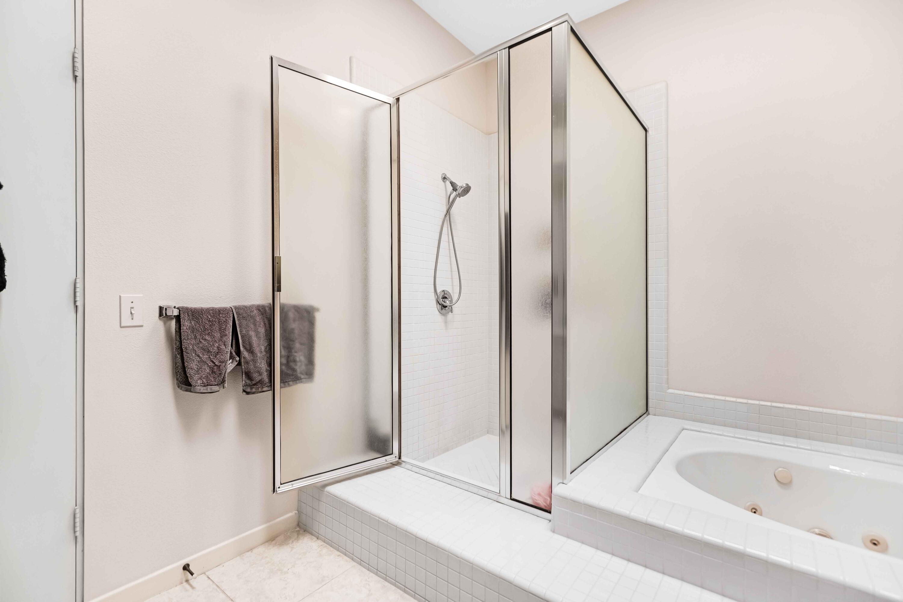 57600 Interlachen La Quinta, CA 92253 - Photo 29 of 87 a bathroom with a tub and shower