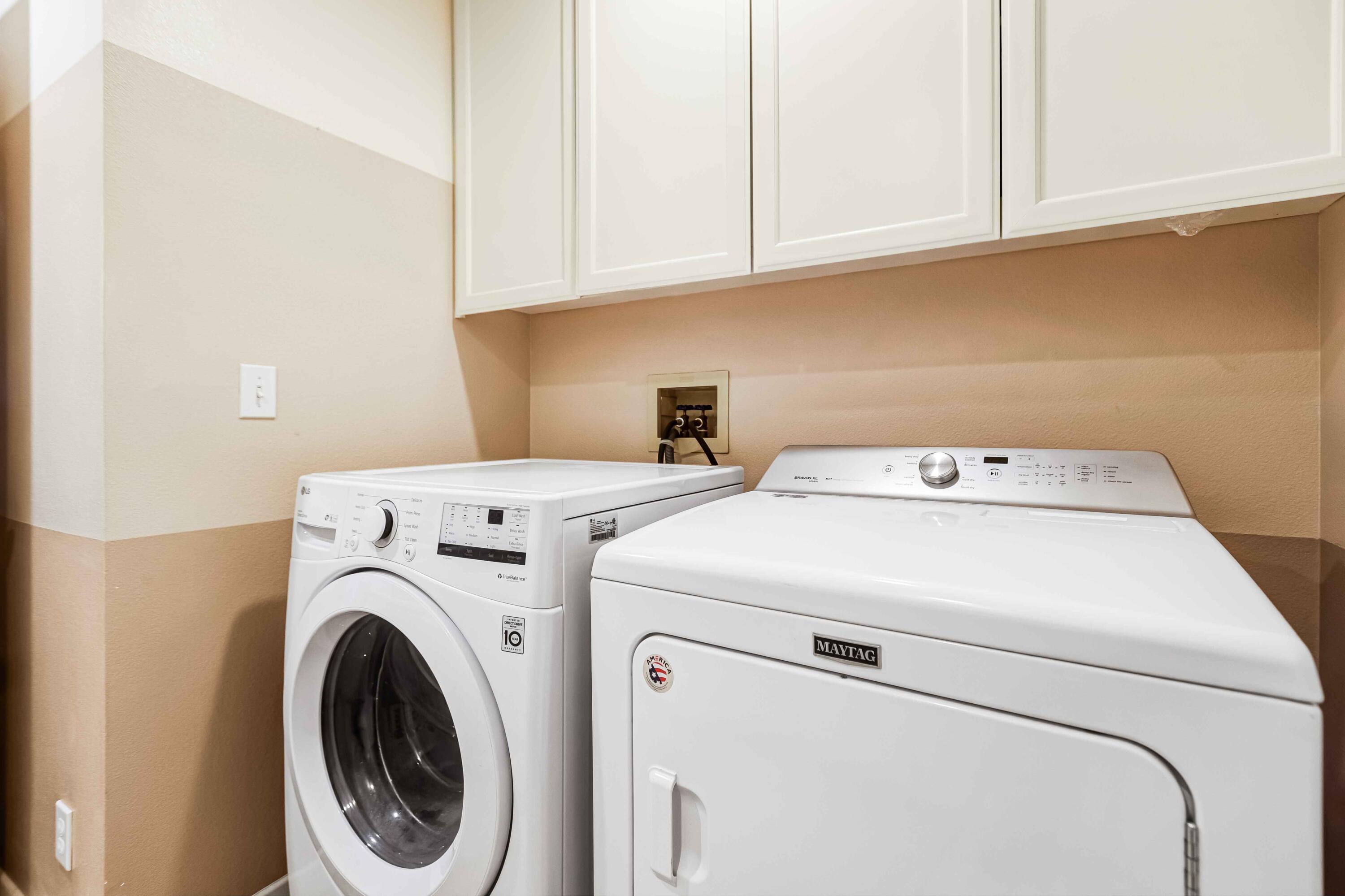 57600 Interlachen La Quinta, CA 92253 - Photo 37 of 87 a utility room with dryer and washer