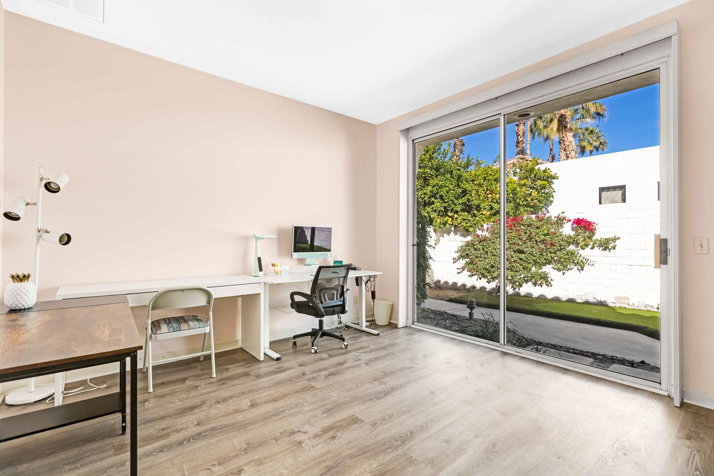 57600 Interlachen La Quinta, CA 92253 - Photo 38 of 87 a workspace with furniture and a window