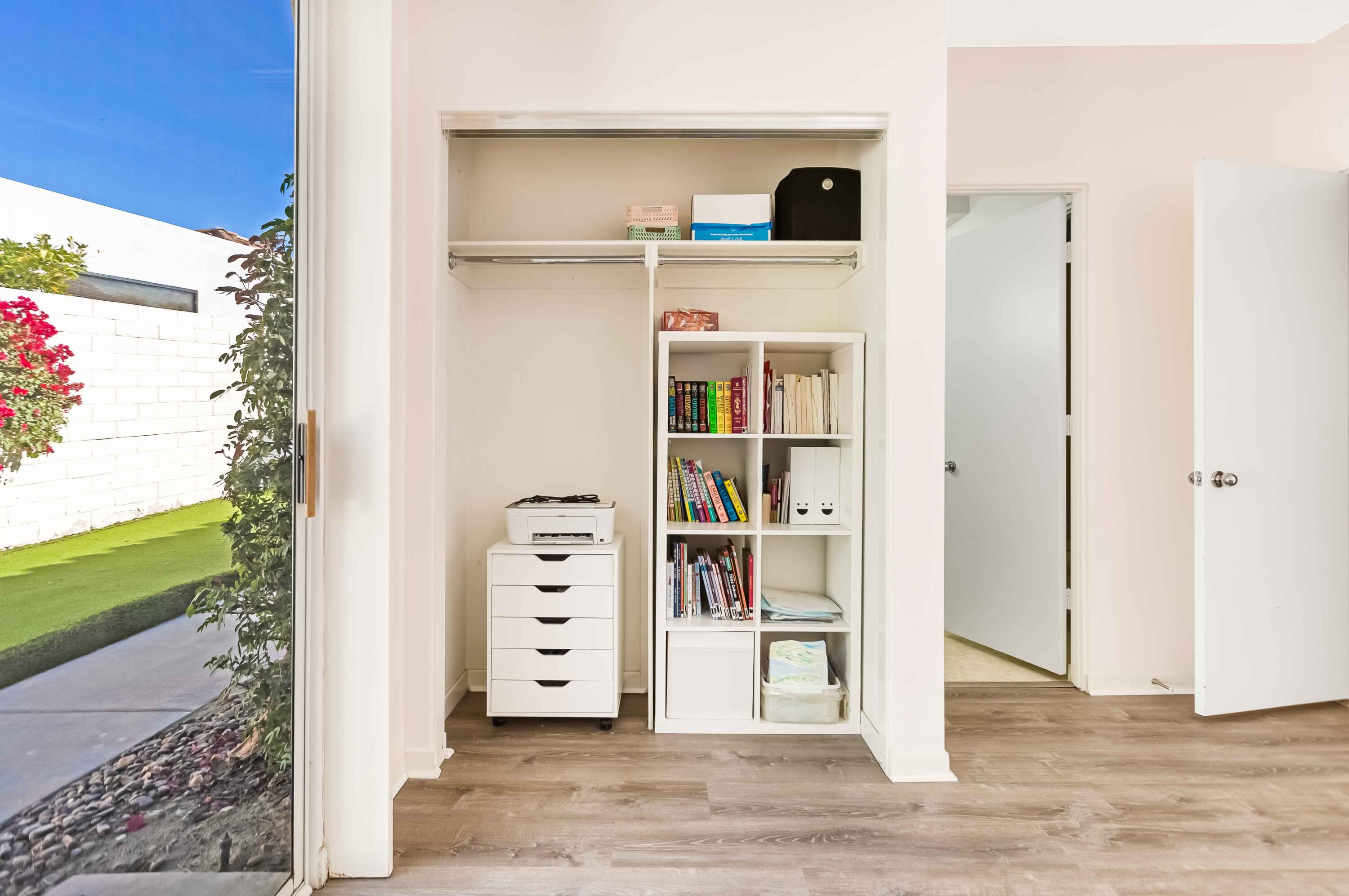 57600 Interlachen La Quinta, CA 92253 - Photo 40 of 87 a view of a bedroom with wooden floor and a cabinet