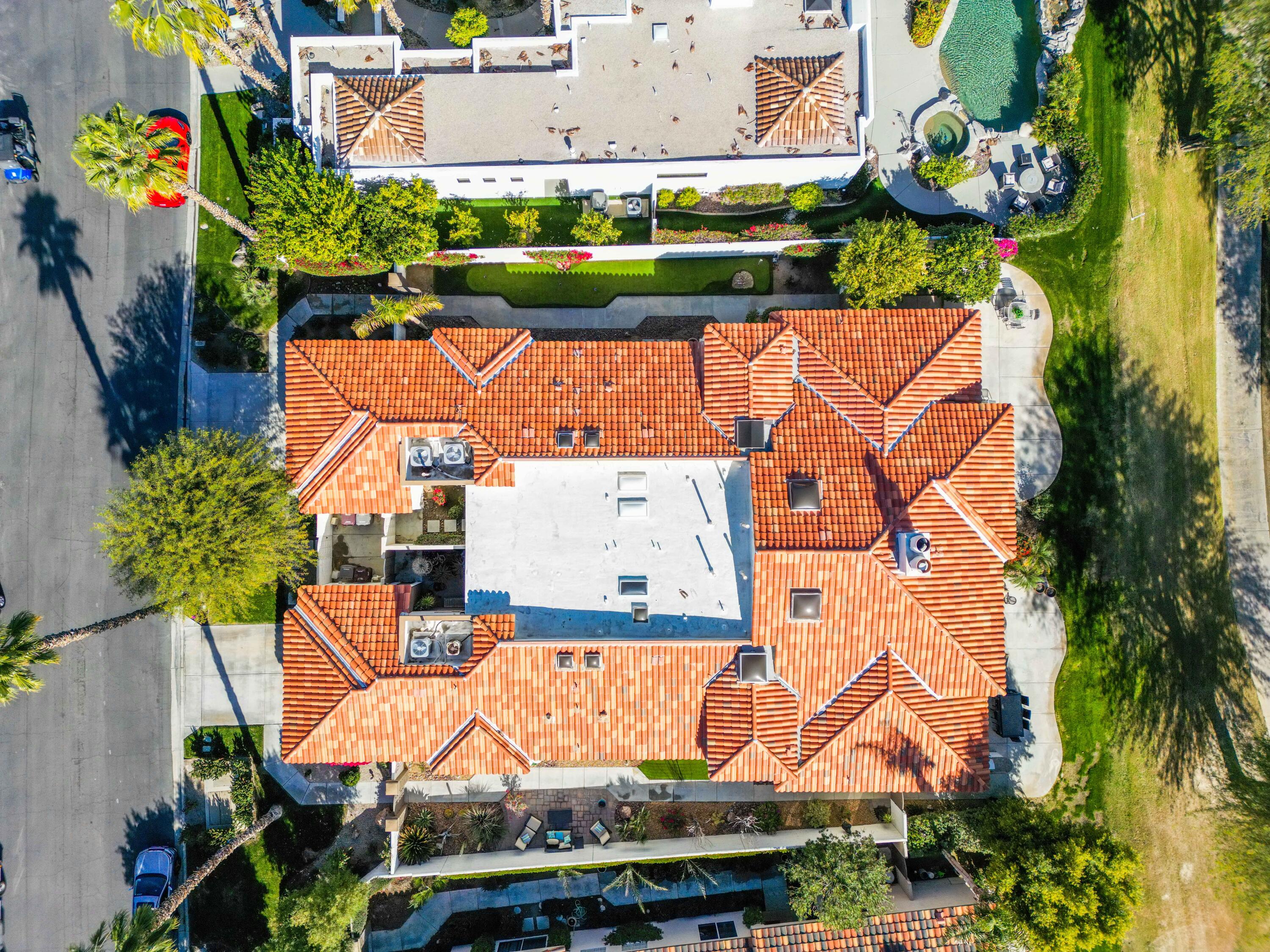 57600 Interlachen La Quinta, CA 92253 - Photo 4 of 87 an aerial view of a house with a yard and a large pool