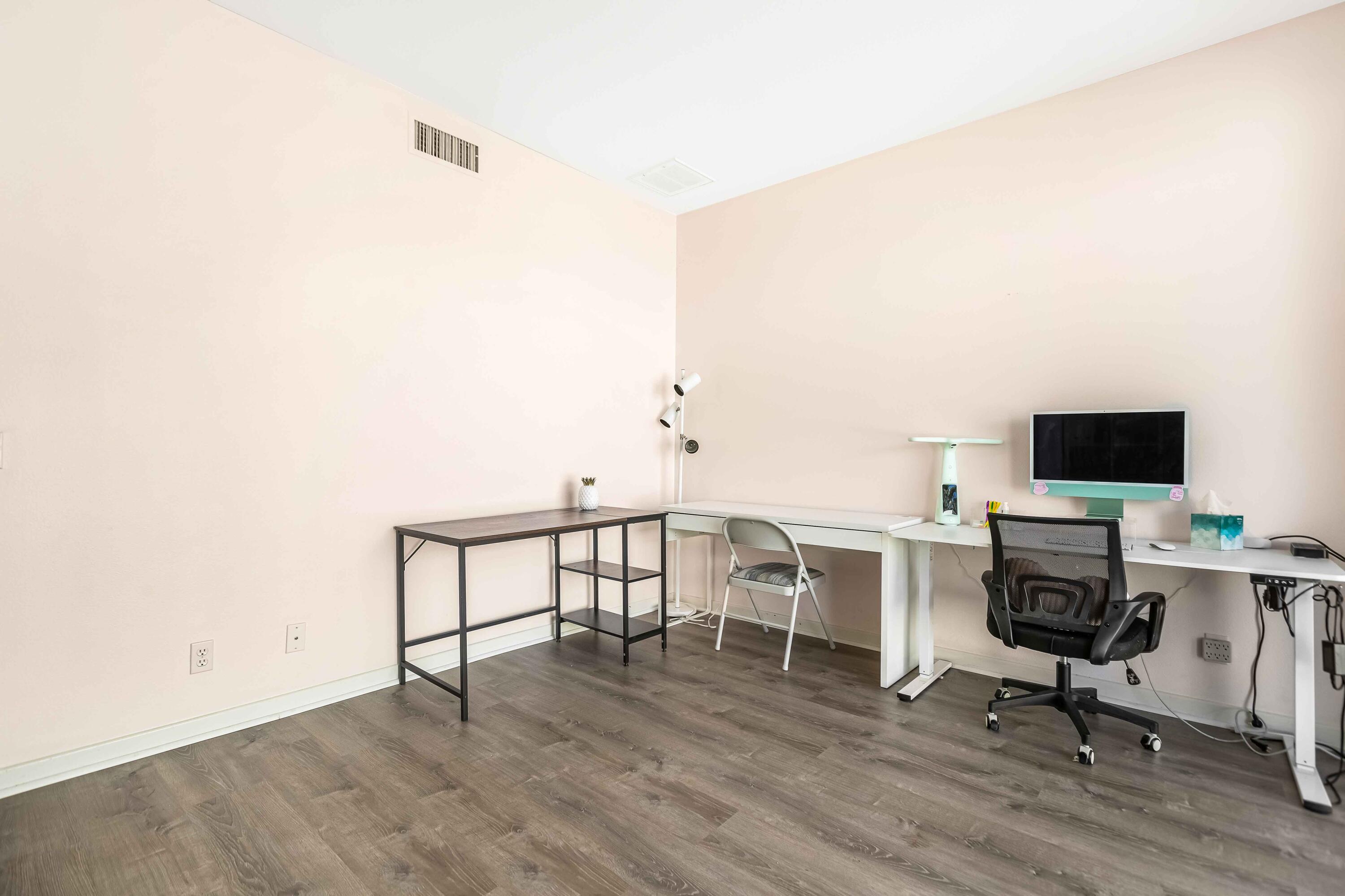 57600 Interlachen La Quinta, CA 92253 - Photo 41 of 87 a view of a workspace with furniture and a window
