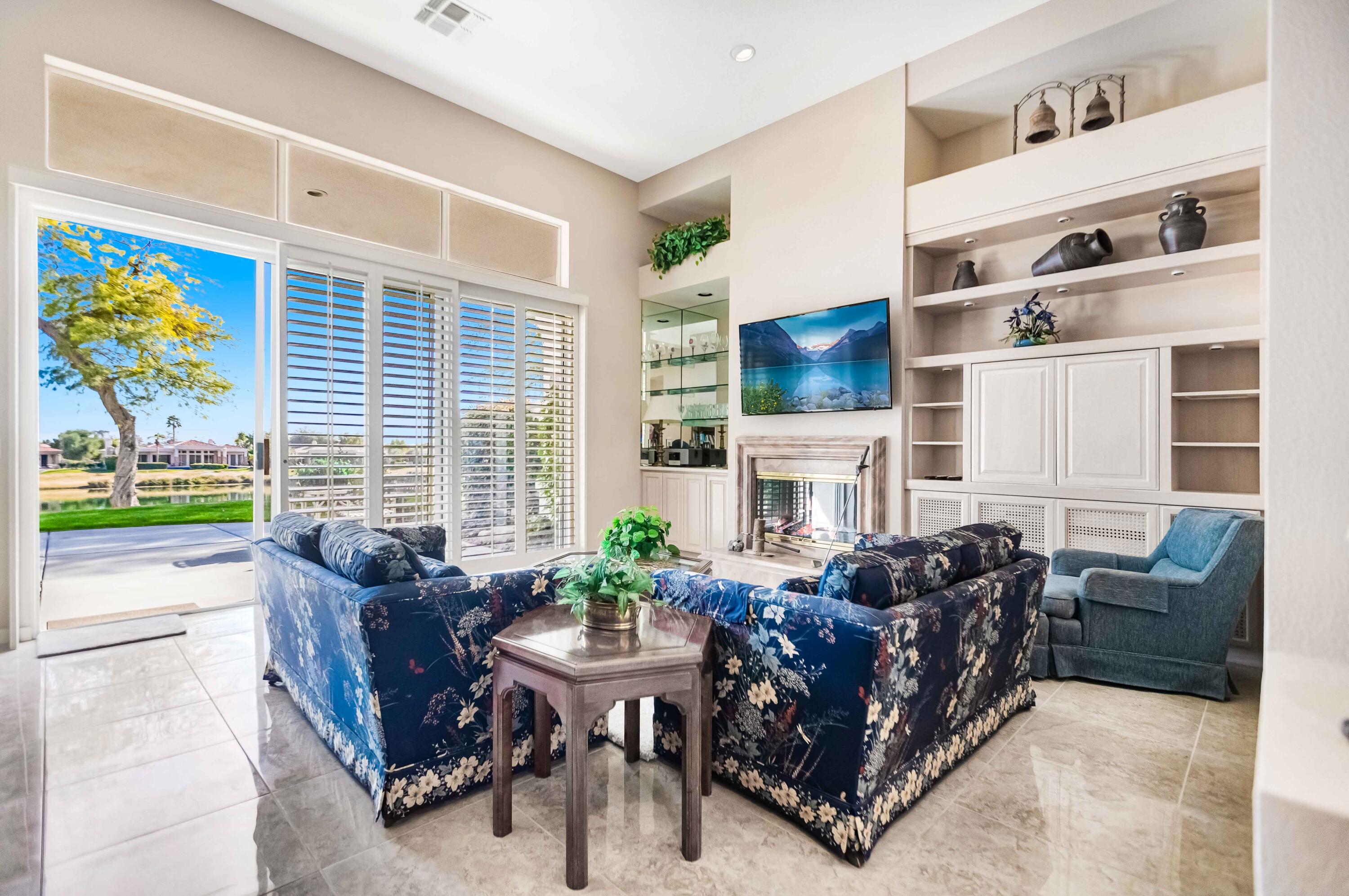 57600 Interlachen La Quinta, CA 92253 - Photo 48 of 87 a living room with furniture fireplace and a large window