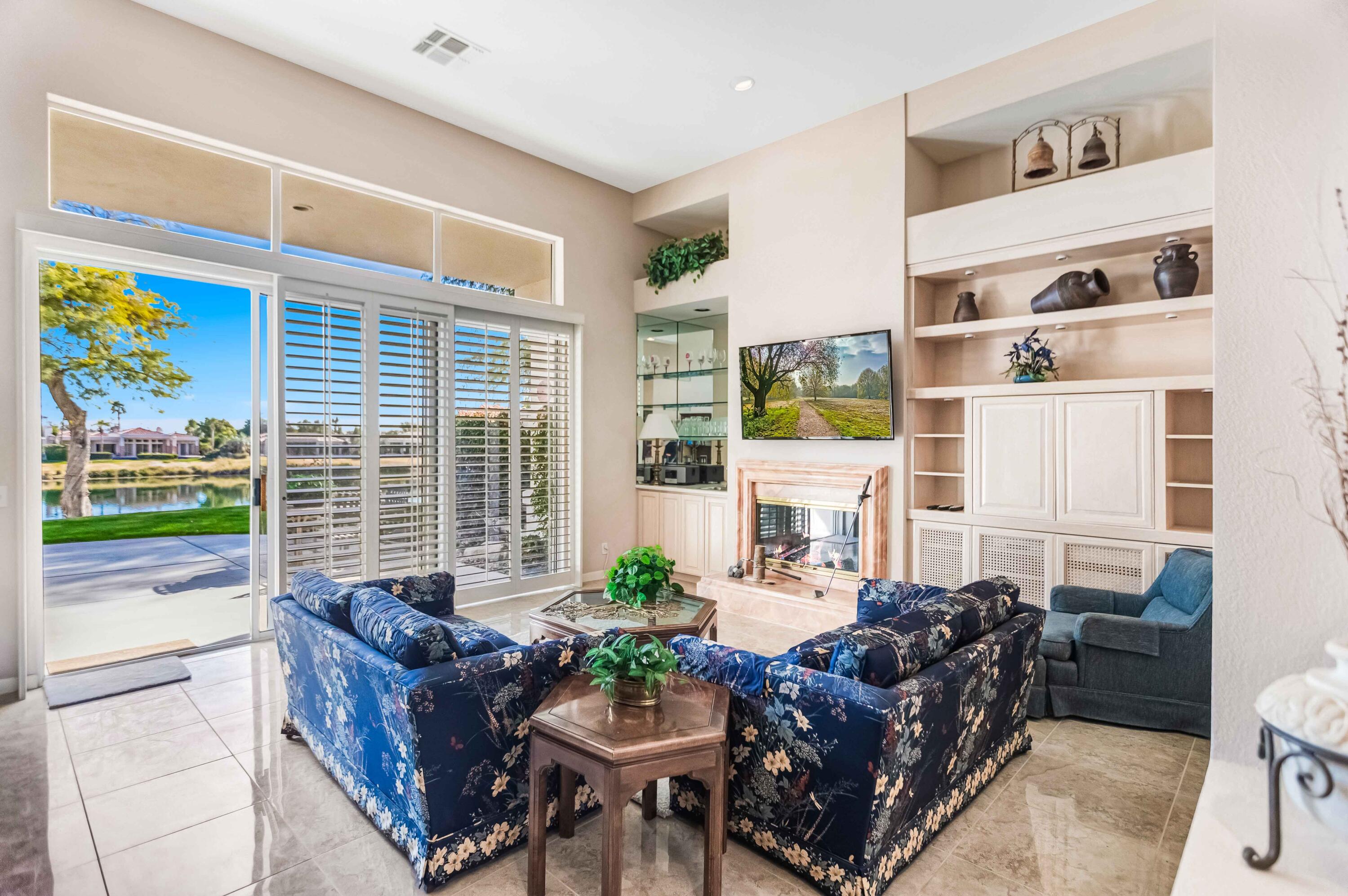 57600 Interlachen La Quinta, CA 92253 - Photo 49 of 87 a living room with furniture and a large window