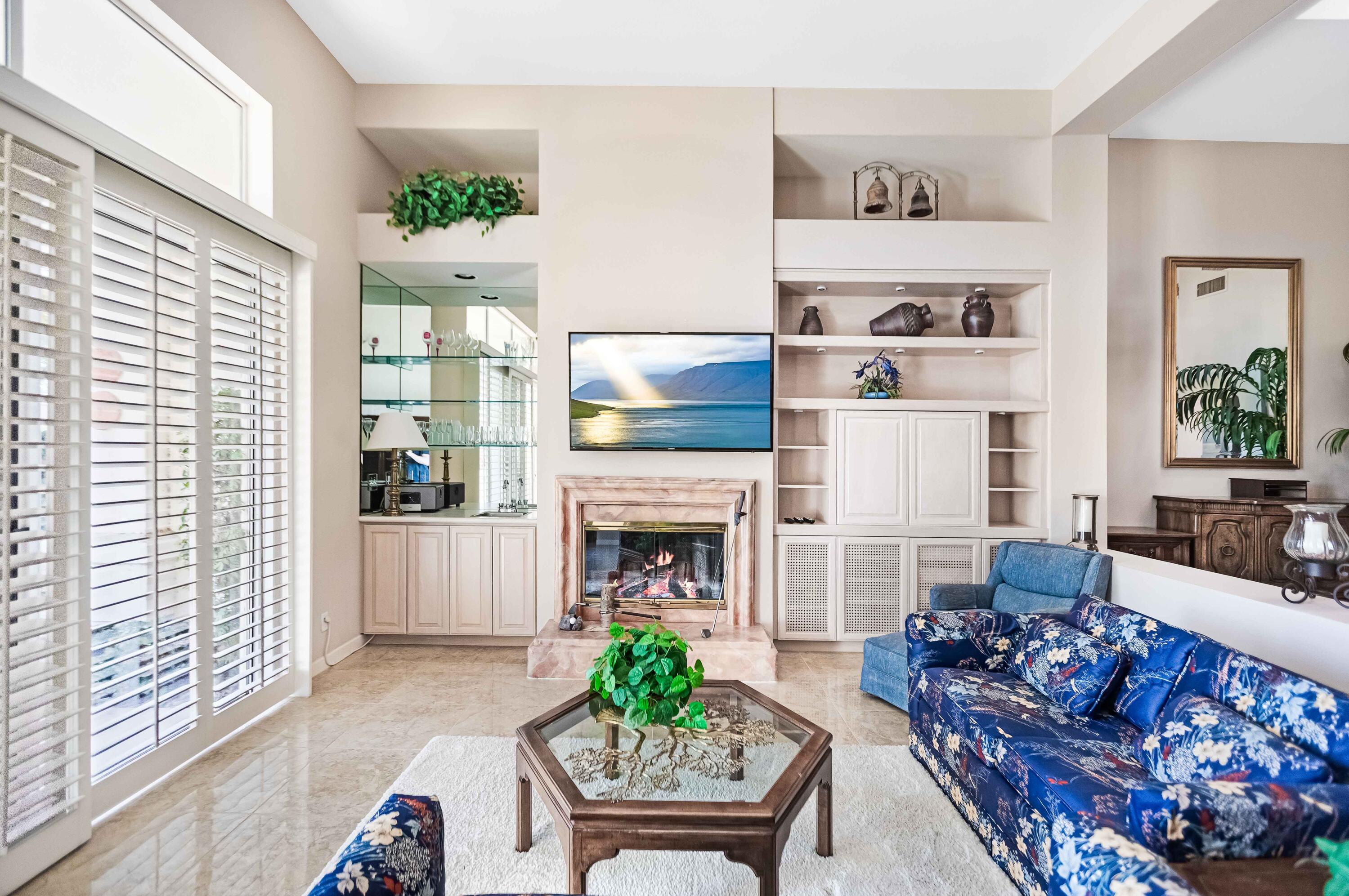 57600 Interlachen La Quinta, CA 92253 - Photo 50 of 87 a living room with furniture and a fireplace