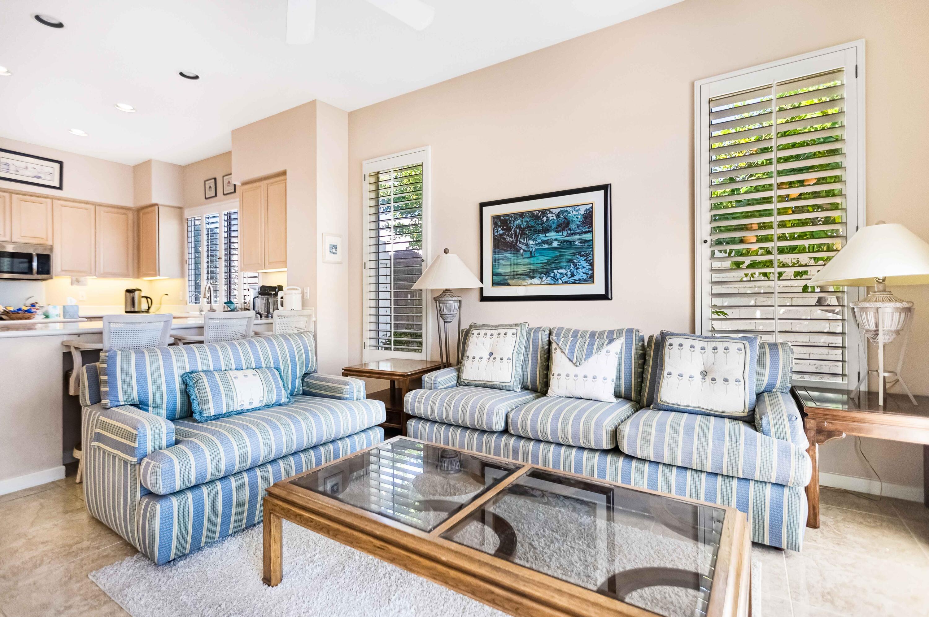 57600 Interlachen La Quinta, CA 92253 - Photo 59 of 87 a living room with furniture and a large window