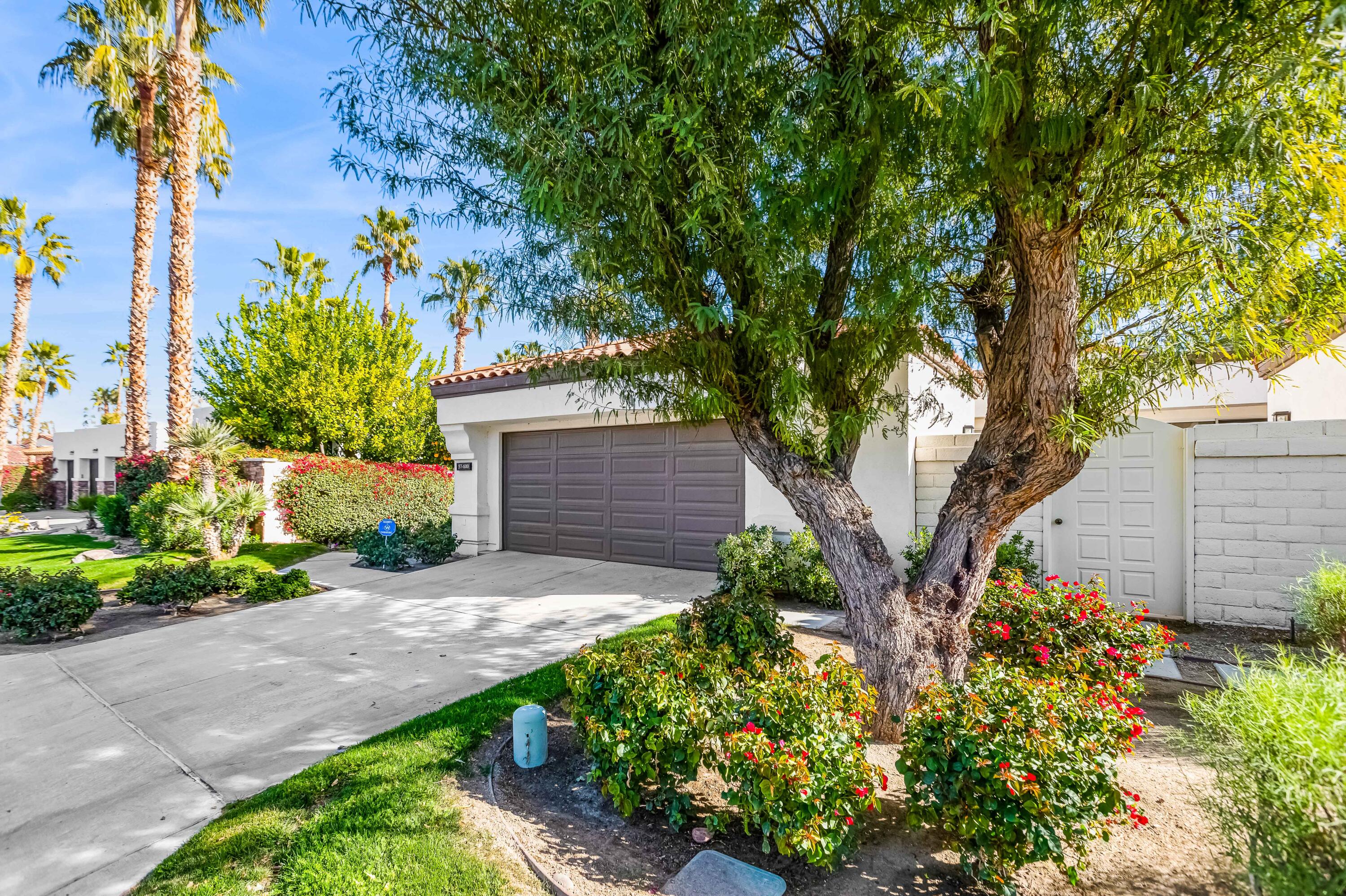 57600 Interlachen La Quinta, CA 92253 - Photo 68 of 87 a front view of a house with a yard