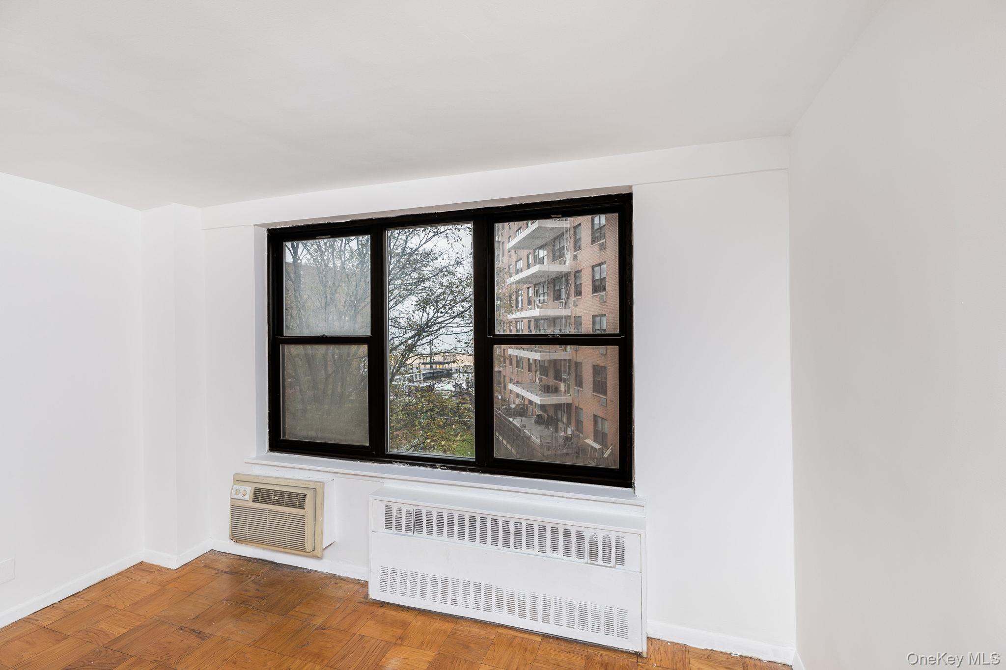 40 Brighton 1st Road, Unit 3J Brooklyn, NY 11235 - Photo 19 of 23 Livingroom with partial beach views
