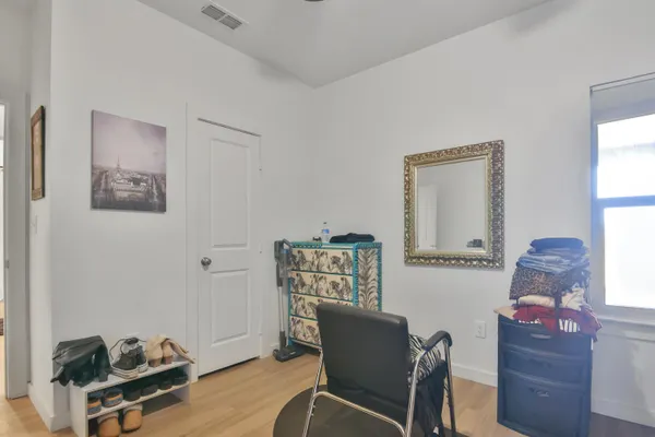 a view of workspace with lounge chair