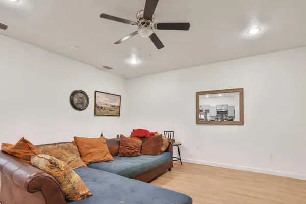 a living room with furniture and a window