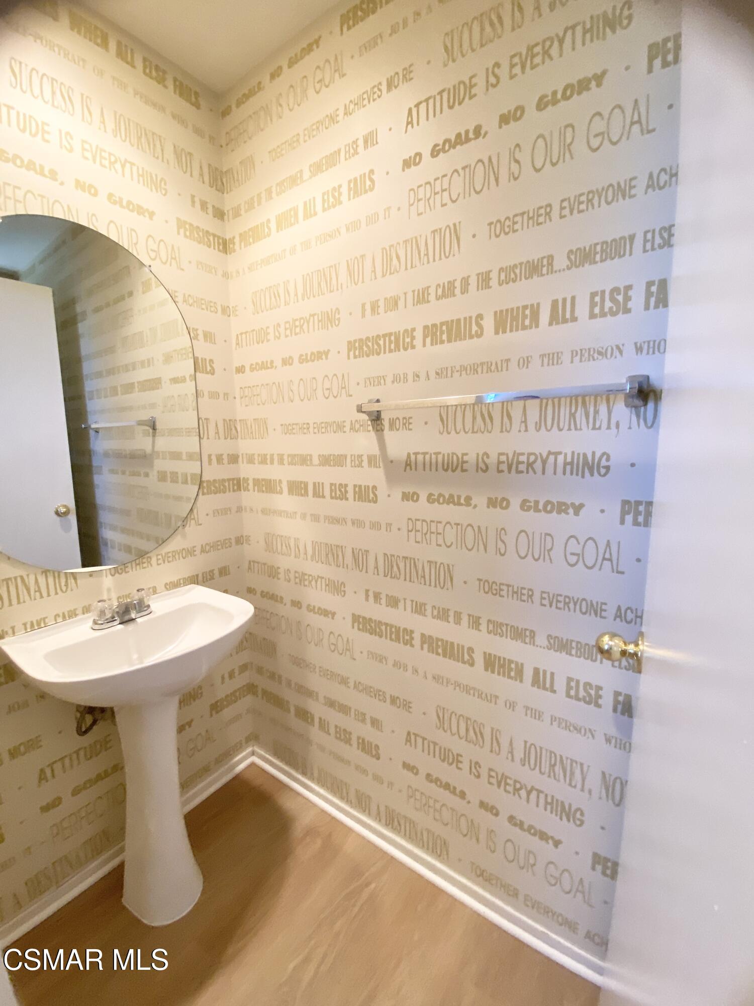 273 Springmist Lane Simi Valley, CA 93065 - Photo 10 of 14 a bathroom with a sink a toilet and mirror