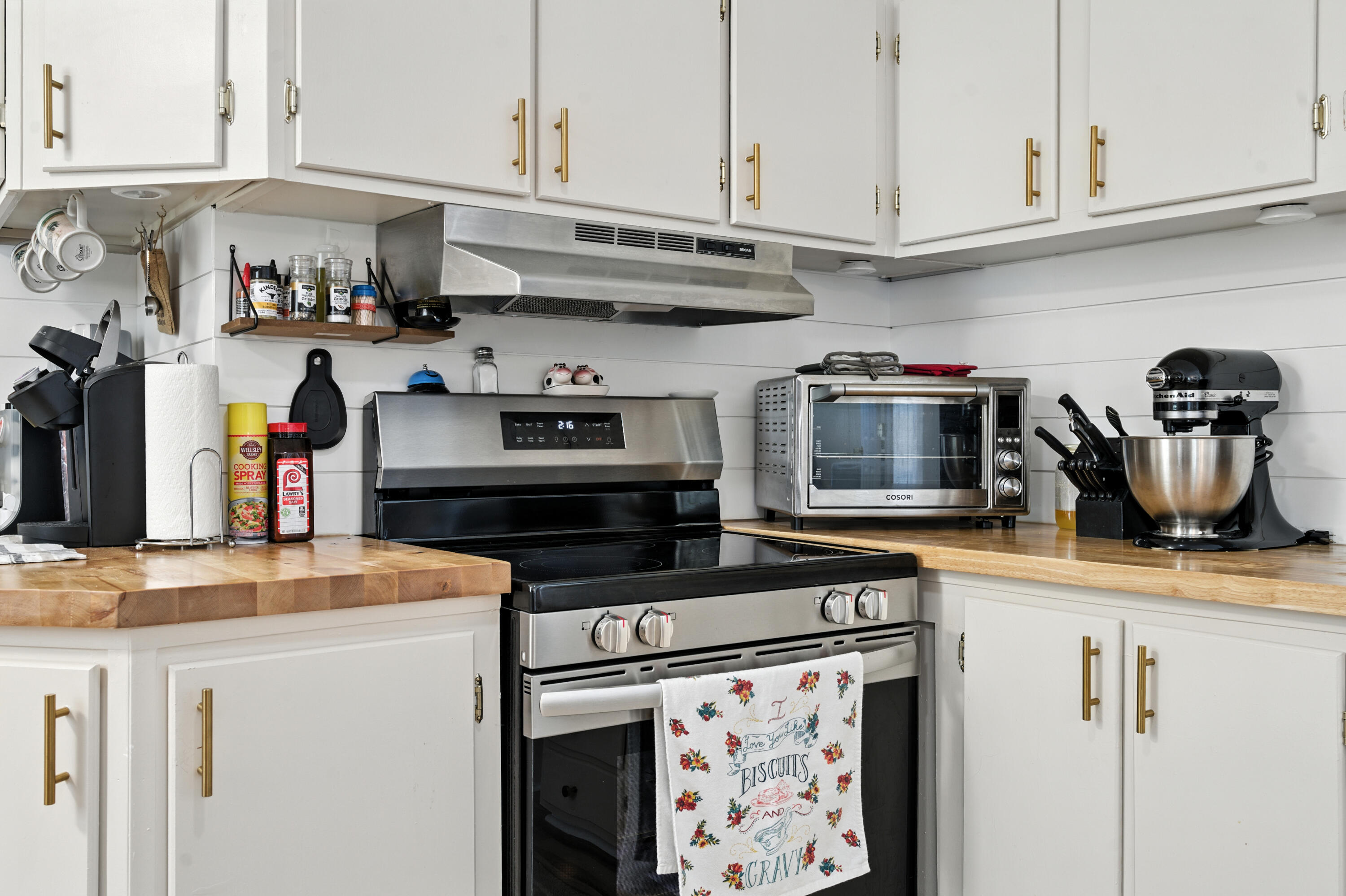 221 Cedar Court Gretna, VA 24557 - Photo 12 of 39 a kitchen with stainless steel appliances granite countertop a stove and cabinets