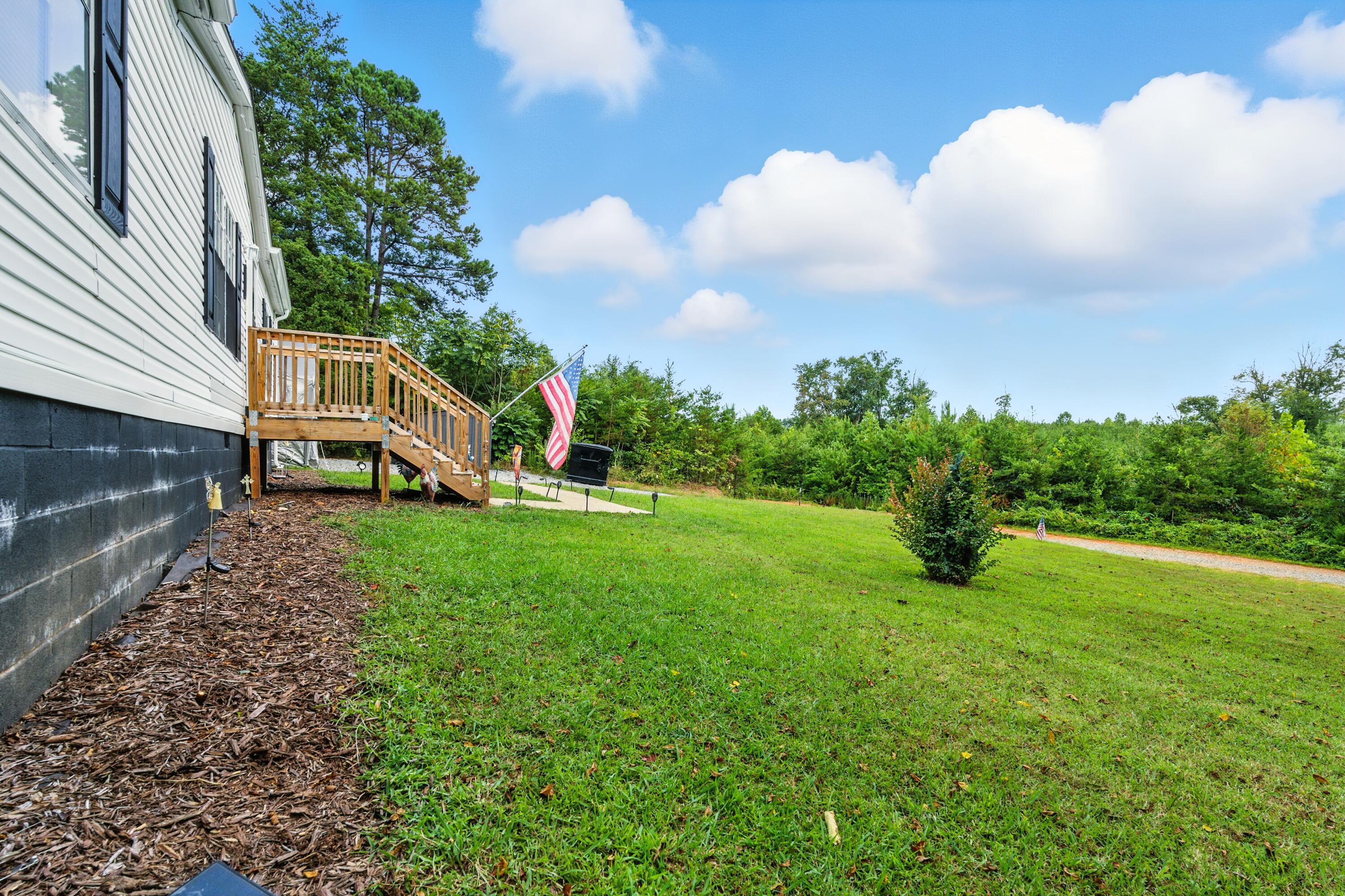 221 Cedar Court Gretna, VA 24557 - Photo 4 of 39 a view of a house with a yard