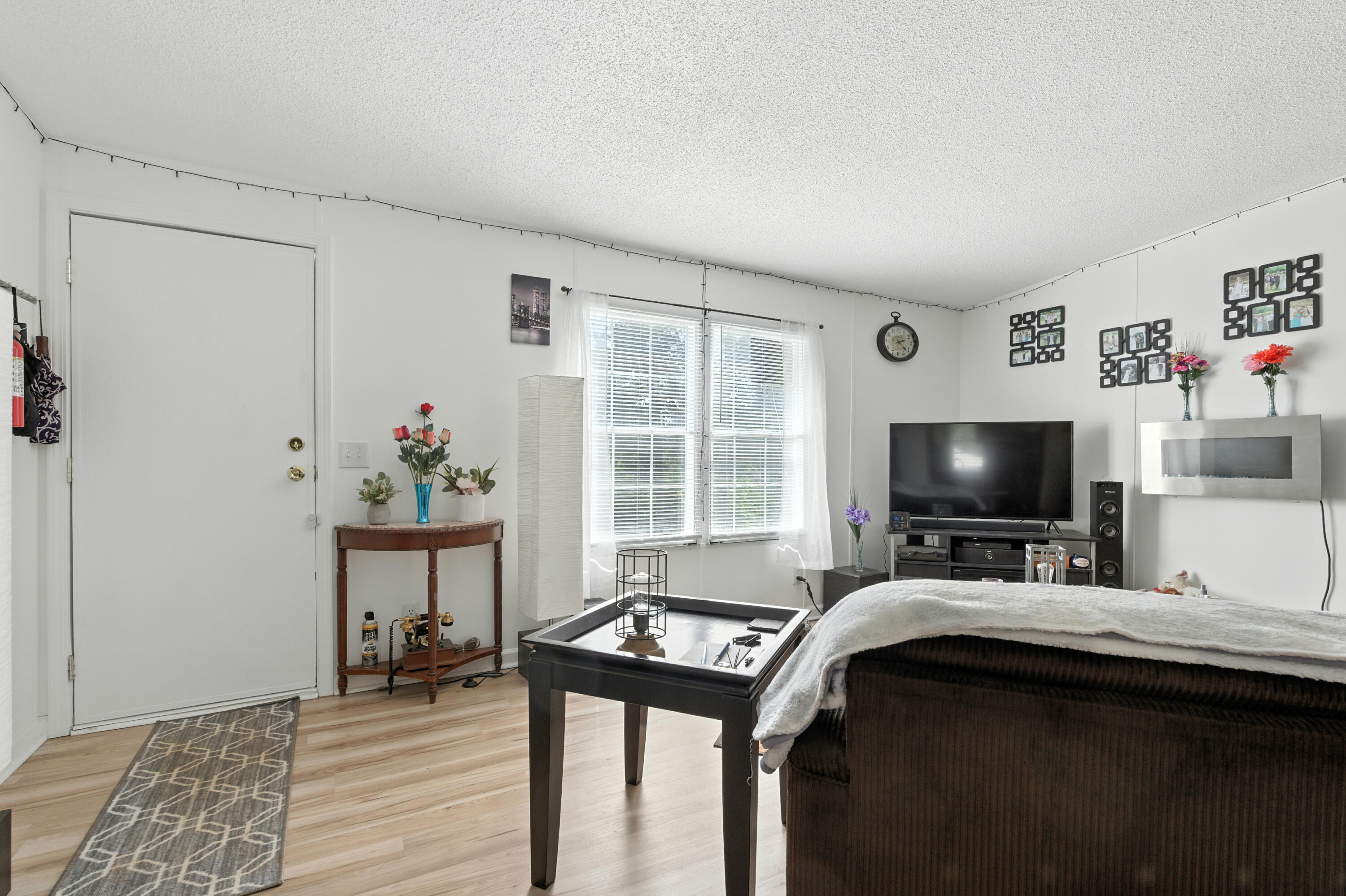 221 Cedar Court Gretna, VA 24557 - Photo 7 of 39 a room with furniture and a flat screen tv