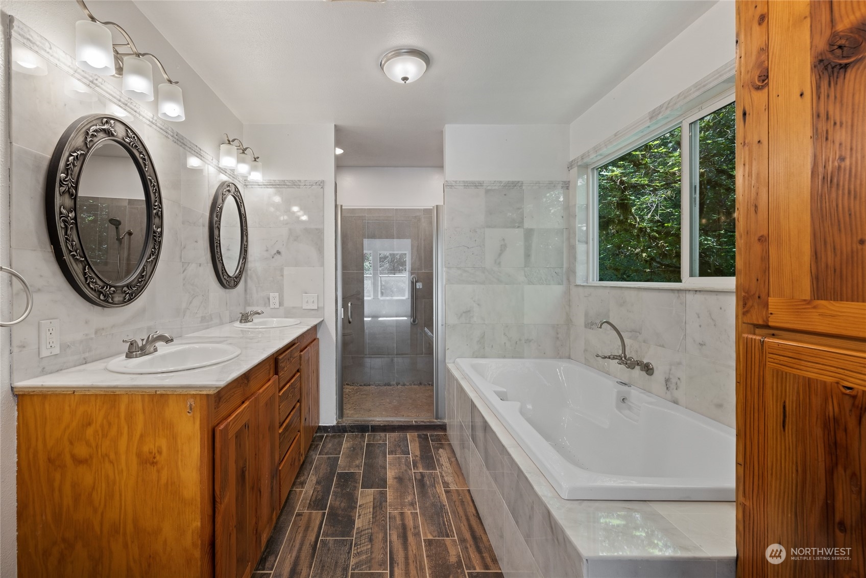 828 Lucas Creek Road Chehalis, WA 98532 - Photo 23 of 36 a bathroom with a sink and a mirror