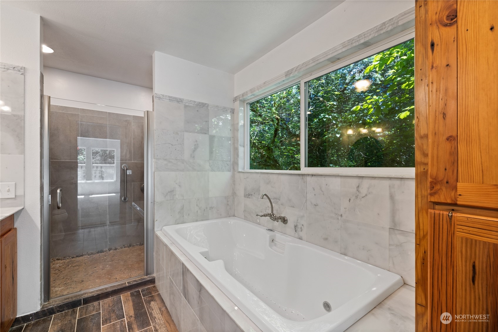 828 Lucas Creek Road Chehalis, WA 98532 - Photo 24 of 36 a bathroom with a bathtub and shower