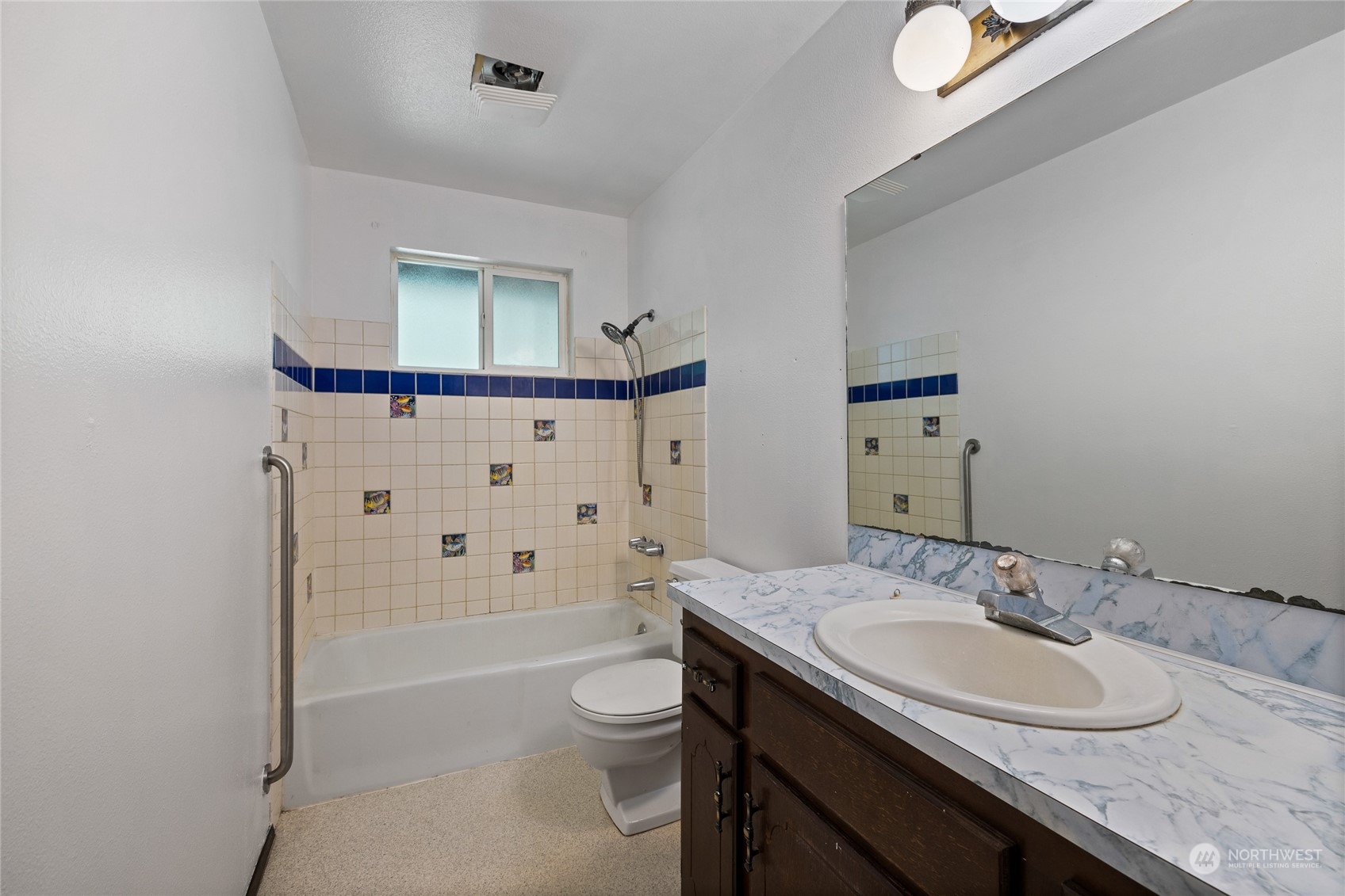 828 Lucas Creek Road Chehalis, WA 98532 - Photo 28 of 36 a bathroom with a granite countertop sink a toilet and shower