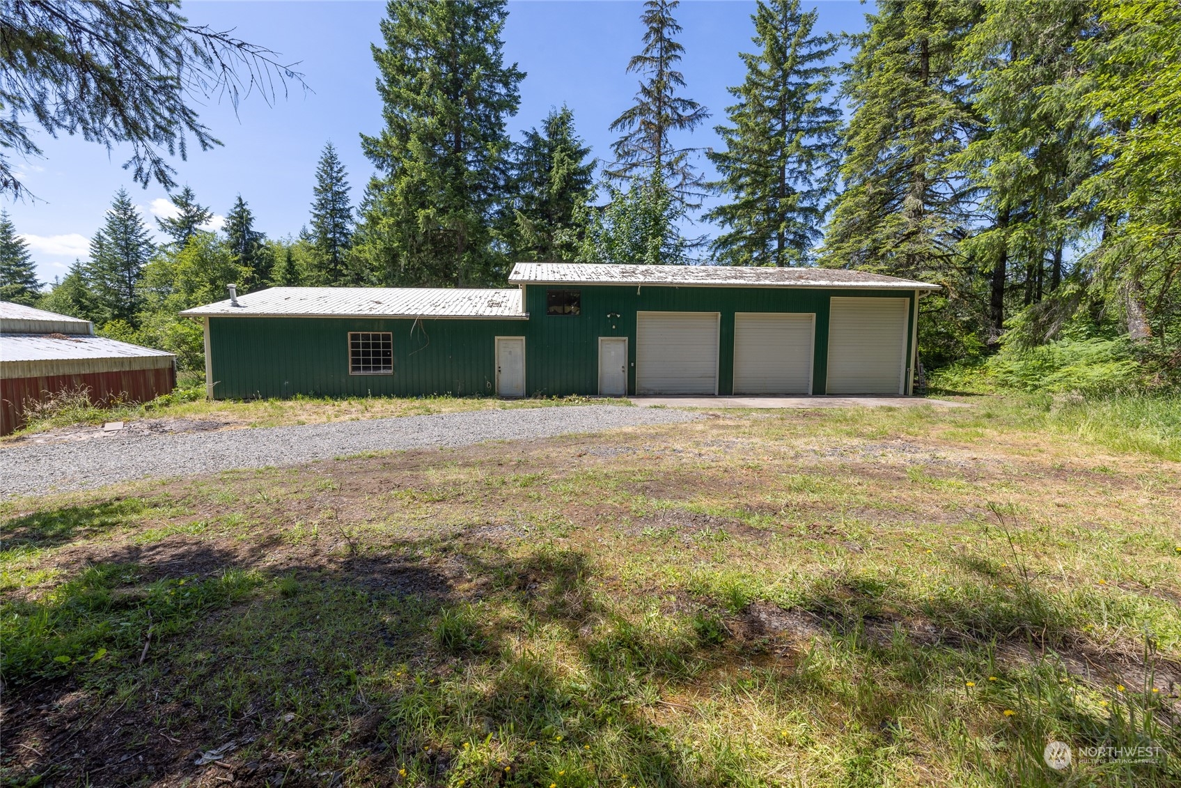 828 Lucas Creek Road Chehalis, WA 98532 - Photo 8 of 36 a front view of house with yard and trees