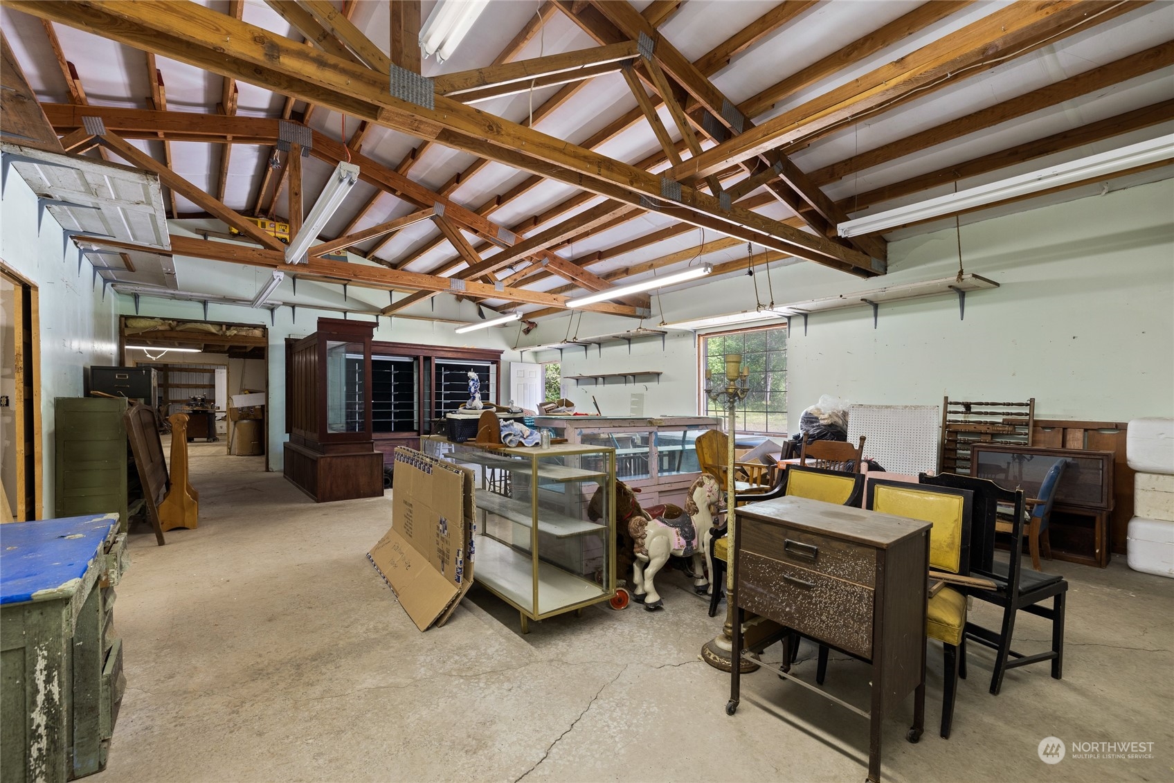 828 Lucas Creek Road Chehalis, WA 98532 - Photo 10 of 36 a view of a storage room with a table and chairs