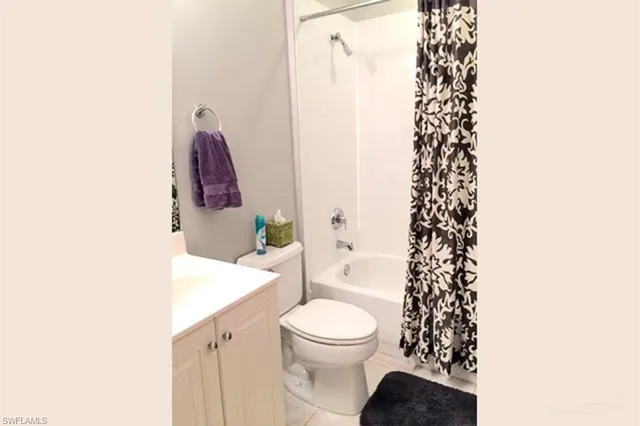a bathroom with a toilet a sink and a bathtub