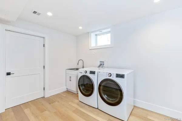a view of cabinets and window