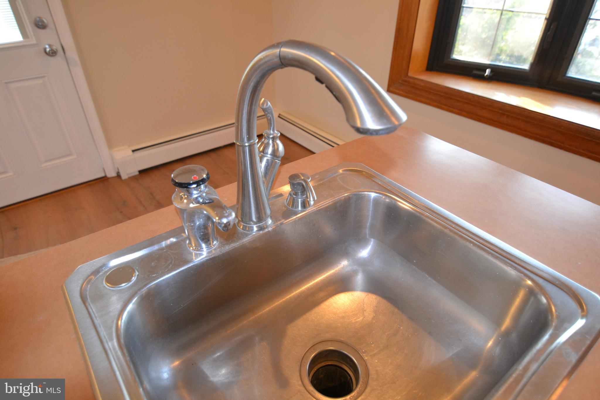 2867 Norcom Road Philadelphia, PA 19154 - Photo 8 of 42 On demand hot water tap at kitchen sink